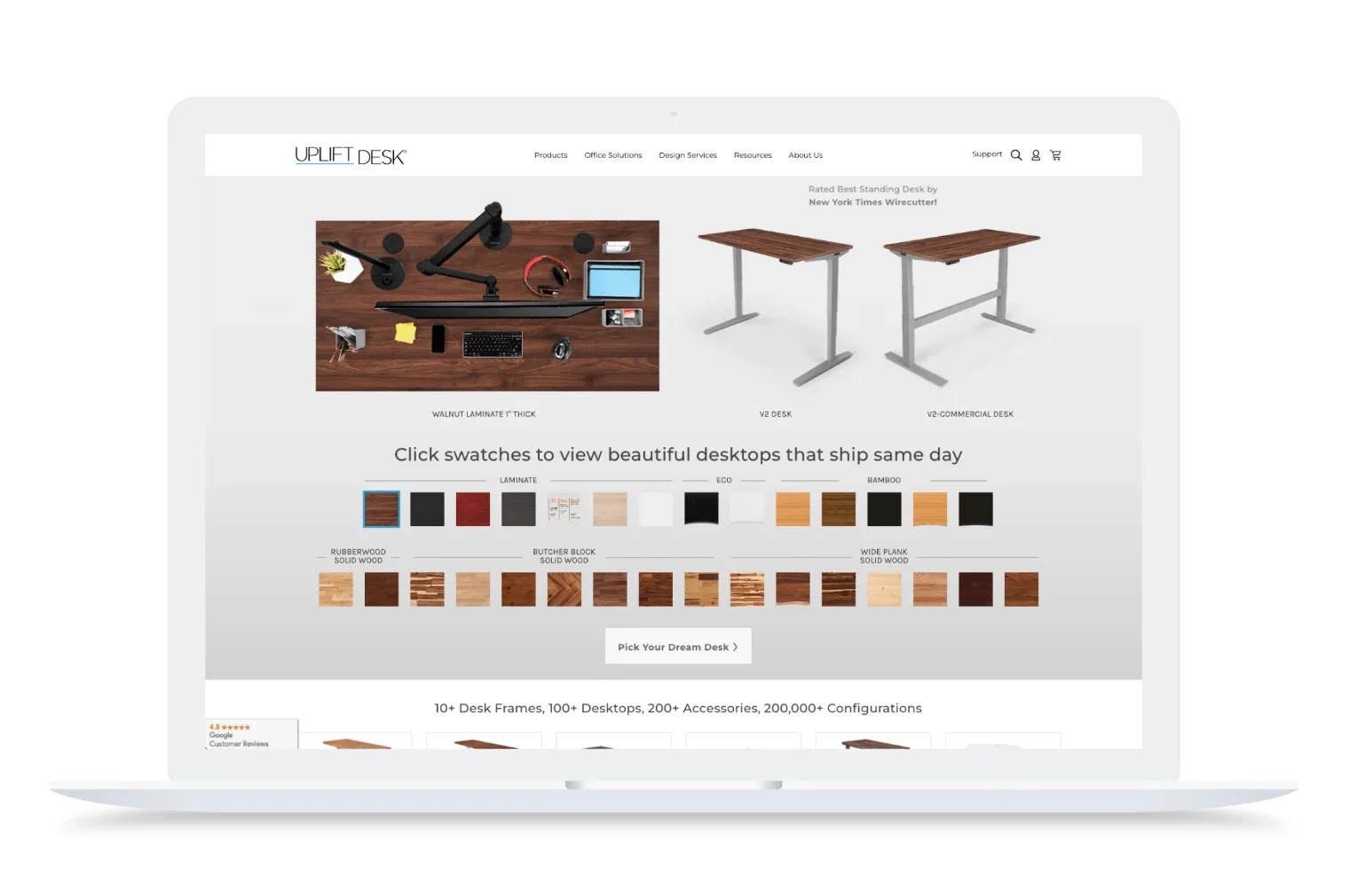 UPLIFT Desk website configurator on a laptop screen, showing adjustable standing desks and wood finish swatches.