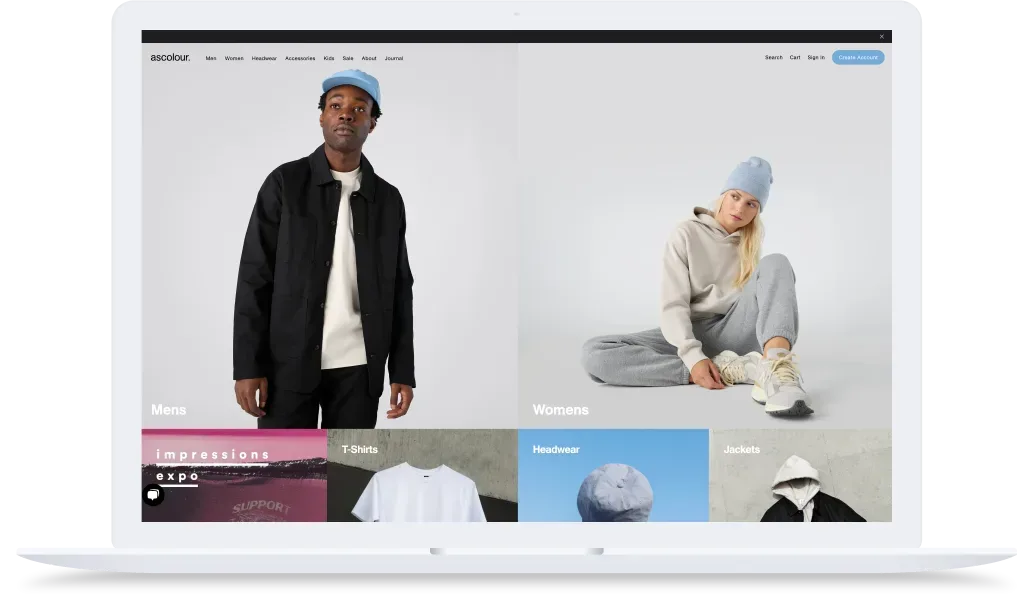 A website shows a man in a black jacket and blue cap and a woman in gray sweats and blue beanie, both modeling casual wear.