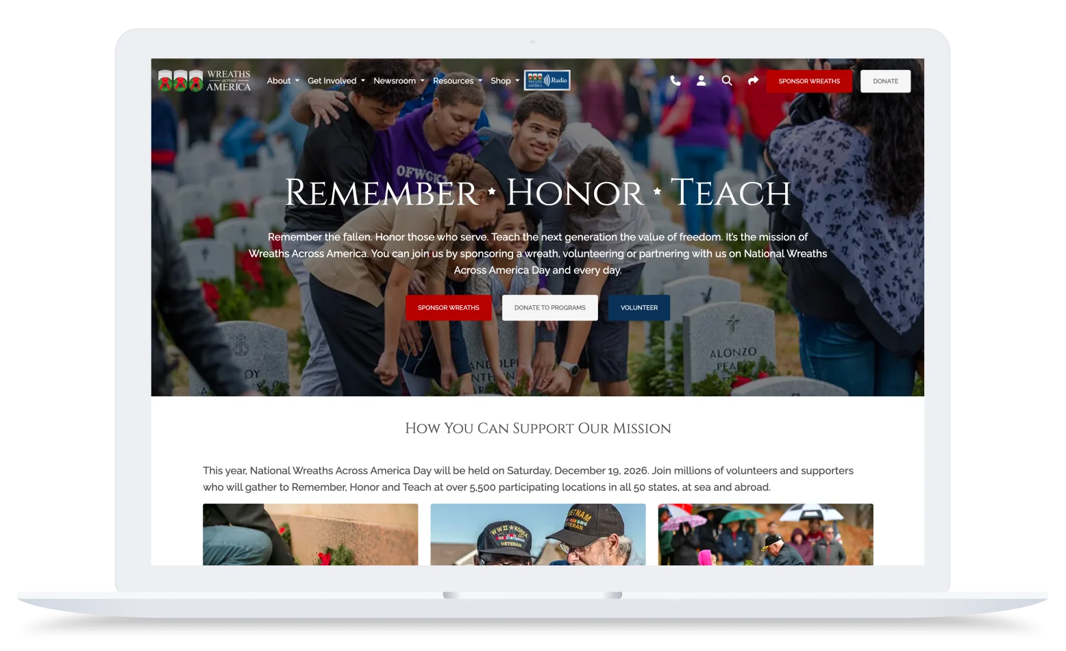 Wreaths Across America website homepage showing children at cemetery with Remember Honor Teach mission statement and donation buttons.