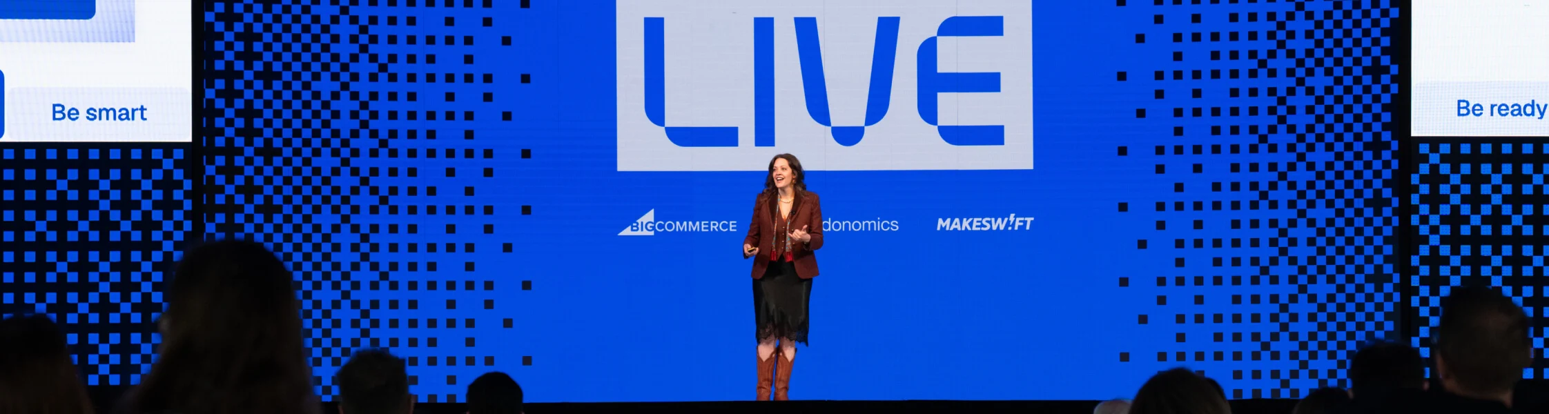 Commerce Live stage presentation highlighting the unified BigCommerce, Feedonomics, and Makeswift platform.