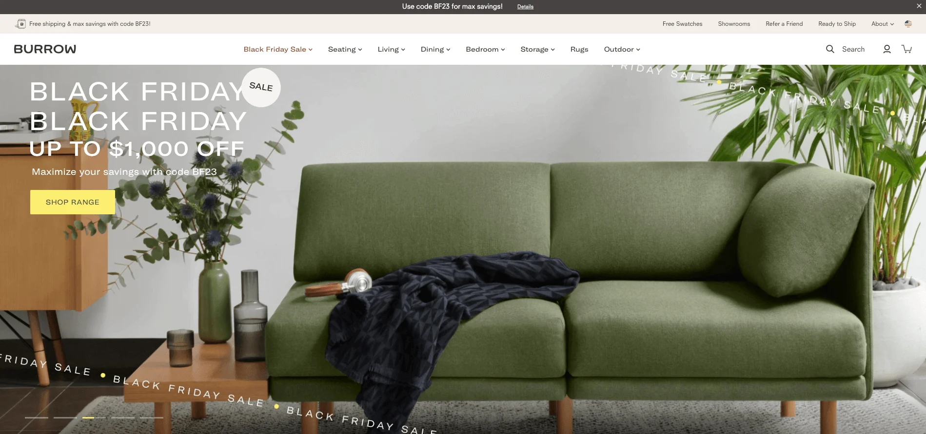 Green sofa with a black throw blanket, wooden table with vases and plants, Black Friday sale text overlay.