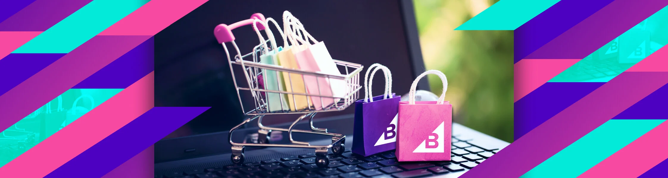 Mini shopping cart with pastel bags on a laptop keyboard, two branded gift bags beside it, colorful geometric border.
