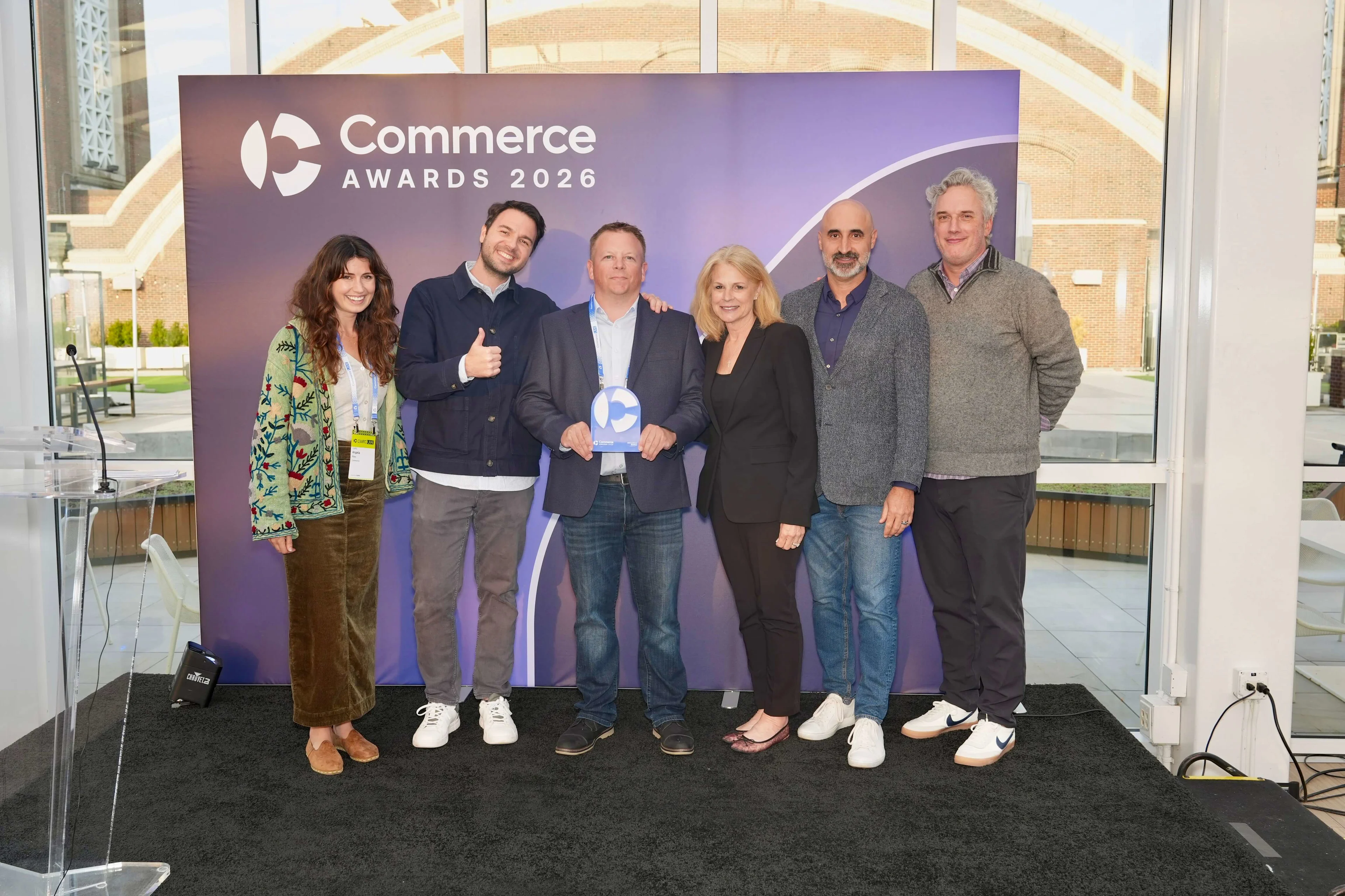 The KONG Company team accepting their Innovation in Digital Excellence award from Commerce.