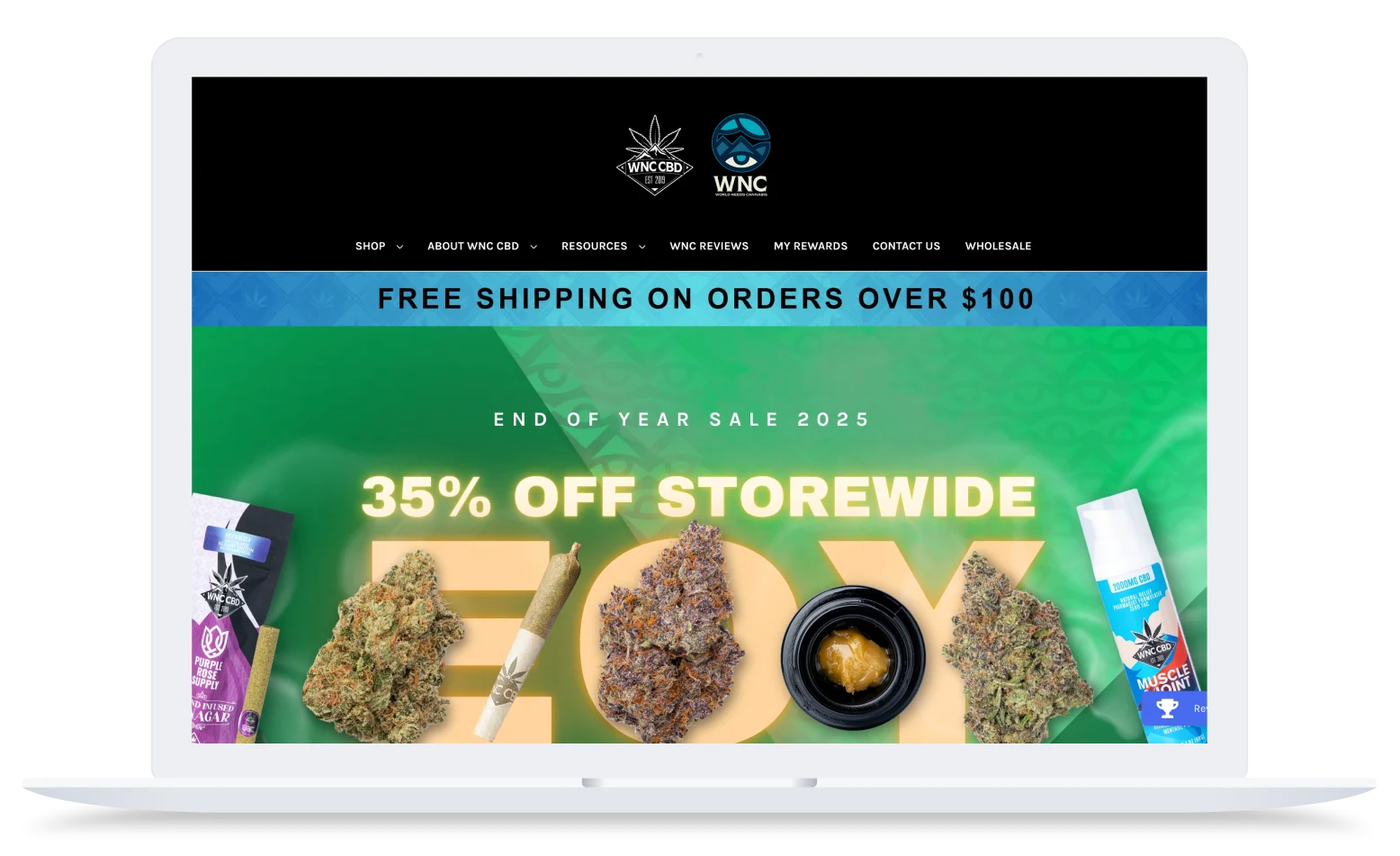 WNC CBD ecommerce homepage displayed on a laptop, featuring a storewide sale banner and product imagery.