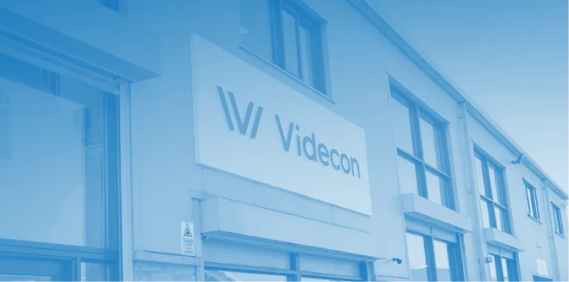 Exterior of Videcon's UK headquarters with the company logo displayed on the building facade.