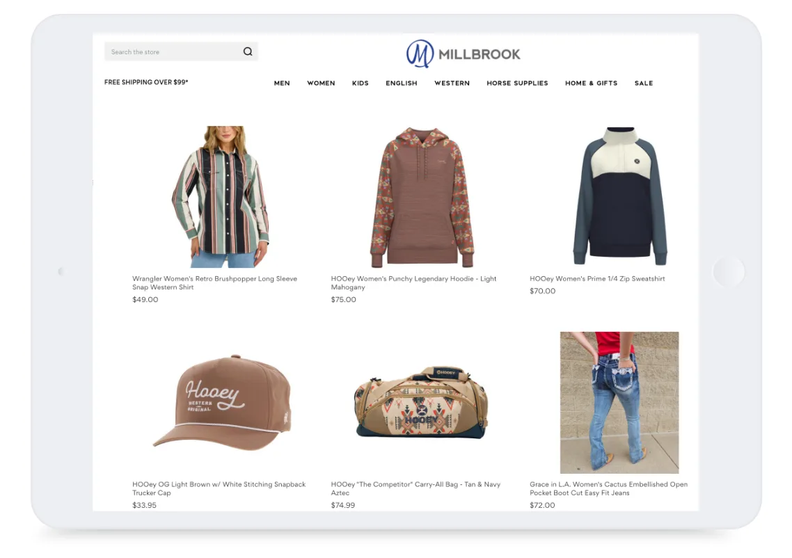 Online store page displaying women’s western shirts, hoodies, a cap, a duffel bag, and jeans on a tablet screen.