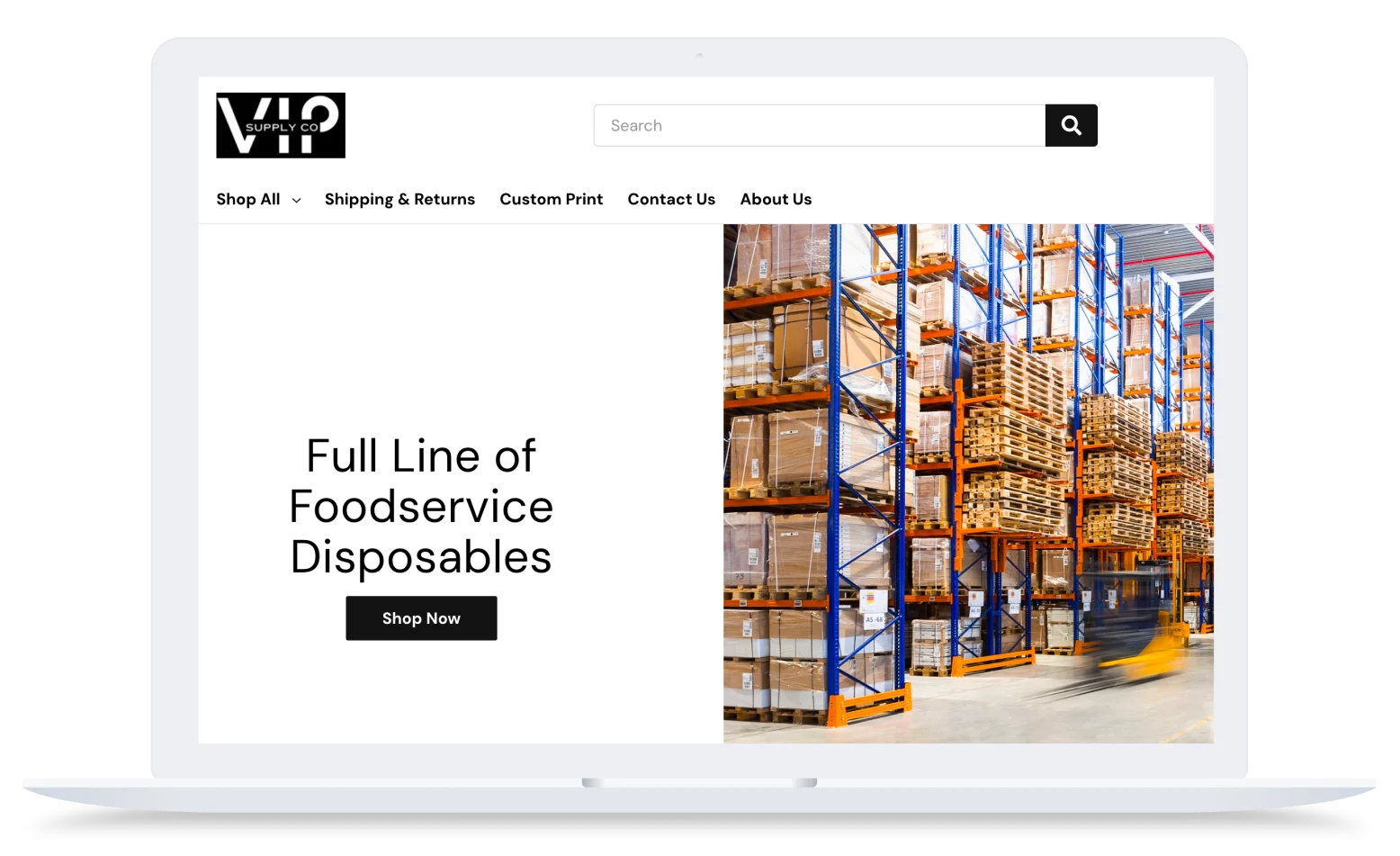 Laptop displaying a supply VIP Supply Co. website homepage.