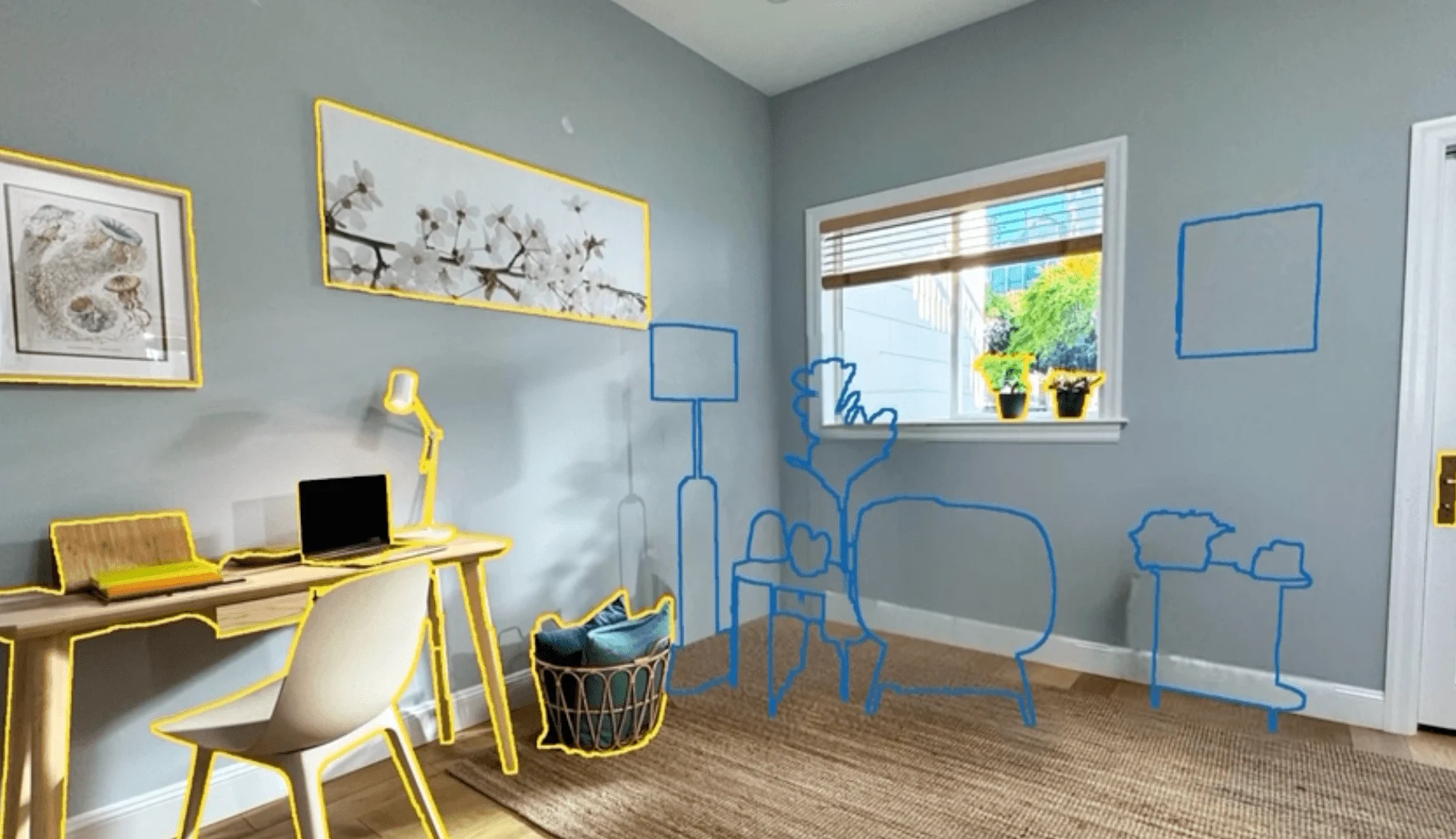Room with gray walls showing yellow desk and chair on left, blue outlined furniture on right, window with plants in center.