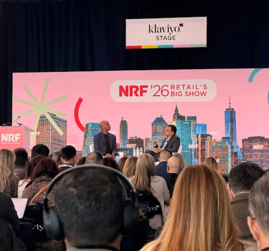 Panel discussion at NRF '26 Retail's Big Show featuring industry experts on the Klaviyo Stage with a large audience.