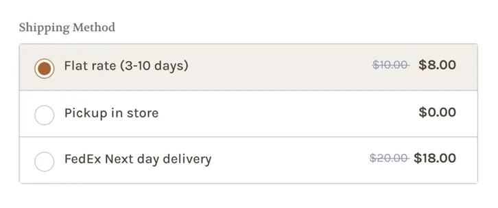 Software mockup of checkout after discounts have been applied to shipping promotions in the form of original price strikethroughs.