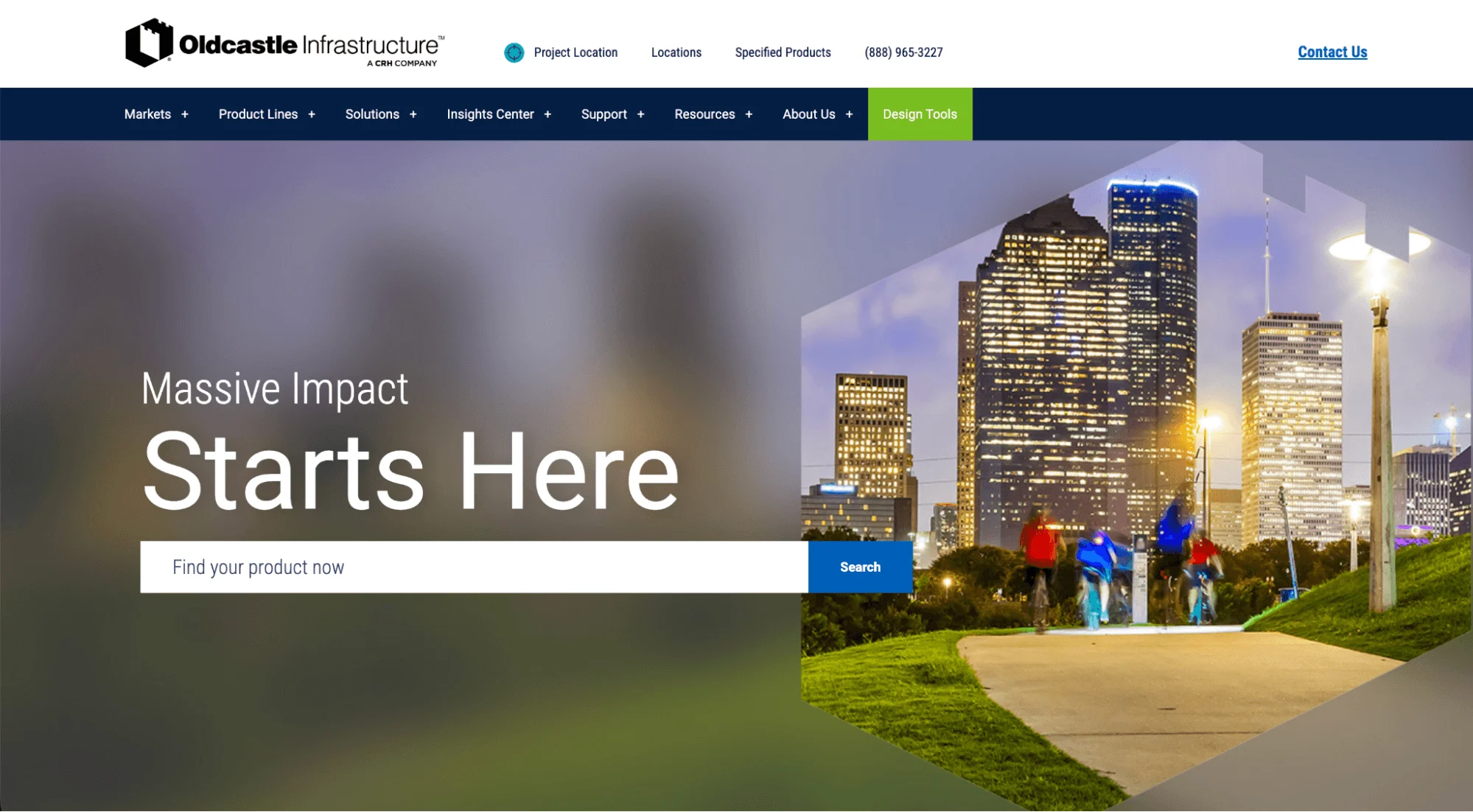 Oldcastle Infrastructure homepage header featuring "Massive Impact Starts Here" text and a city skyline.