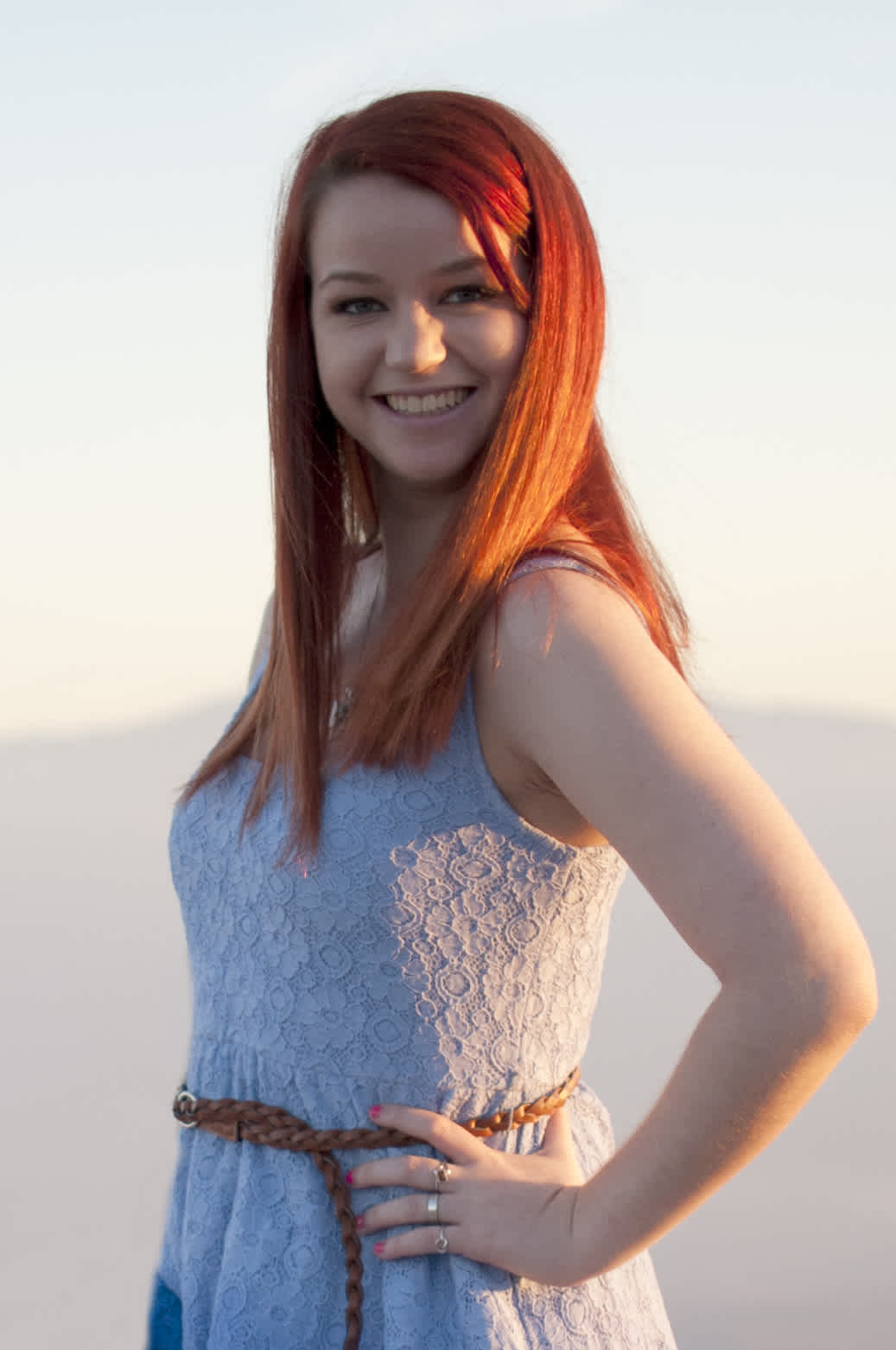 Girl with red hair in sunlight.