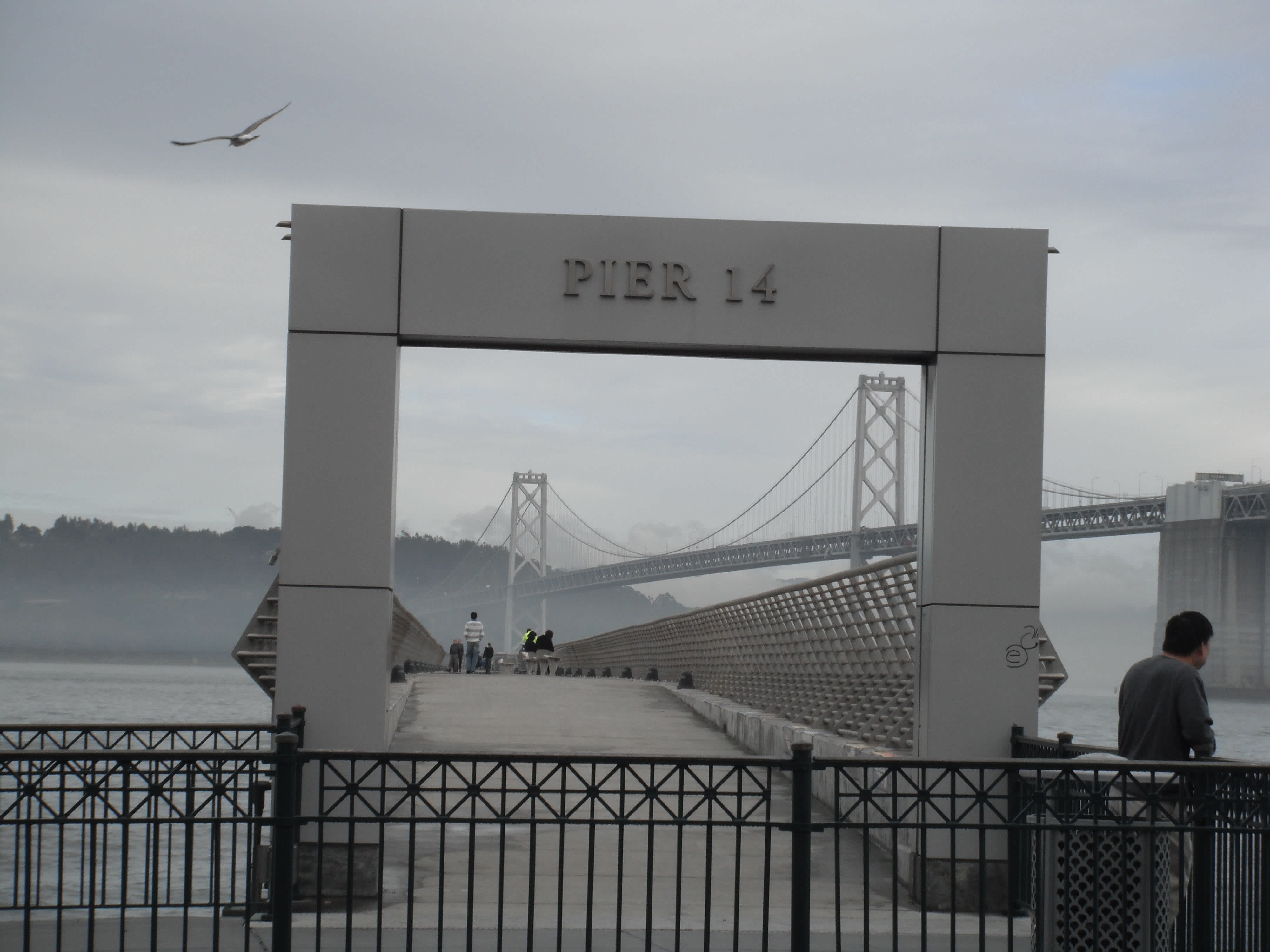 Pier 14 sign in front of a bridge in Ferry Building, San Francisco, California. 