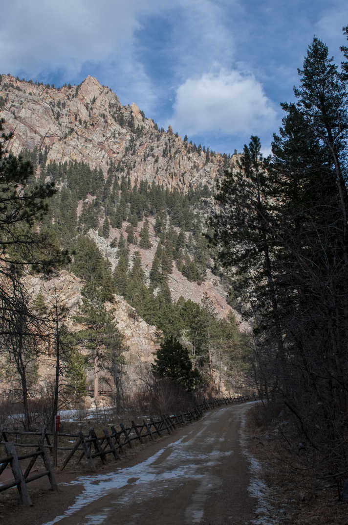 dirt trail with some snow and ice in front of mountains in Eldorado Canyon State Park #Boulder #Colorado #Nature #StatePark #EldoradoCanyon