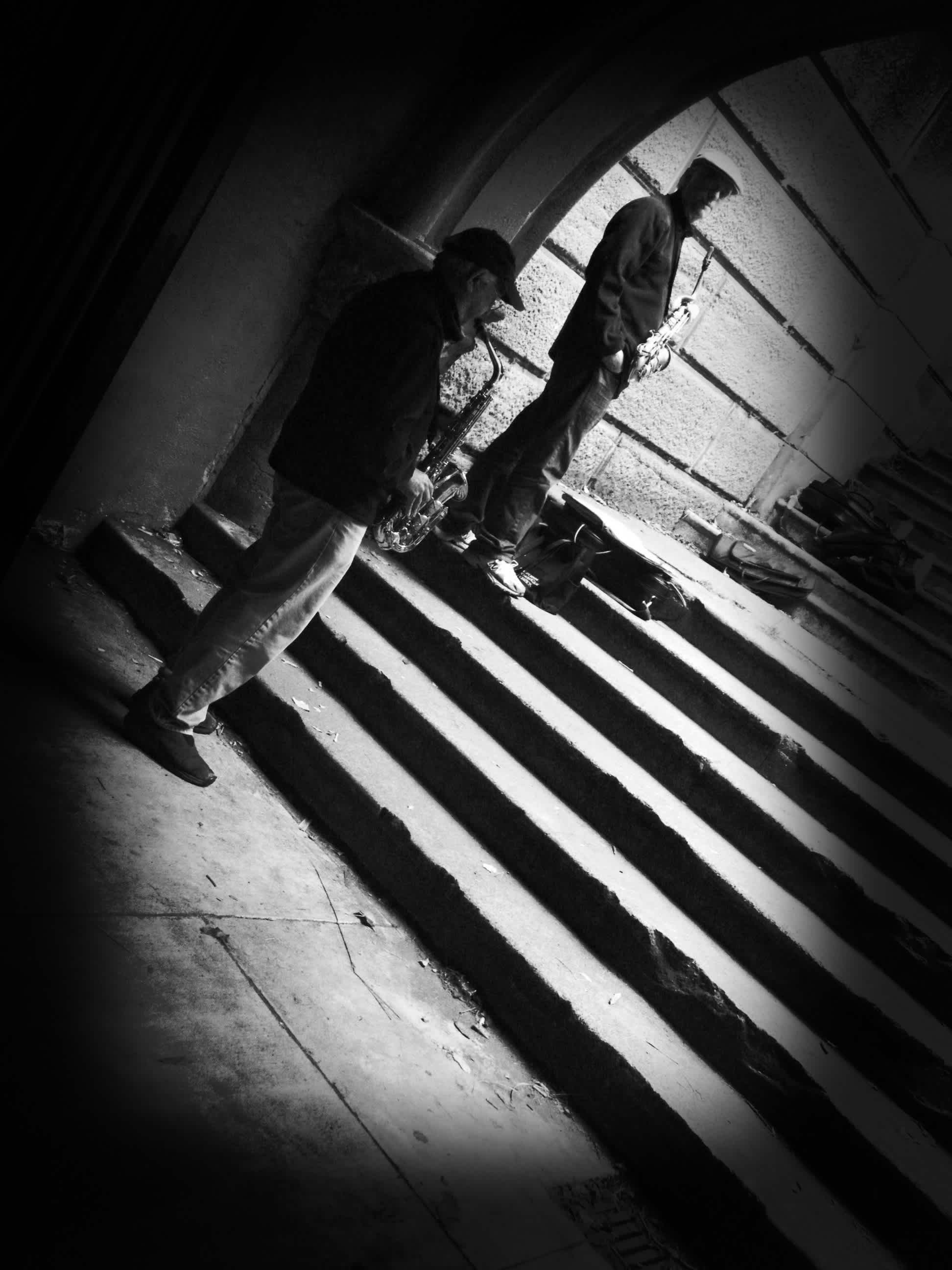 People standing on a stairwell in black and white in Golden Gate Park, San Francisco, California.