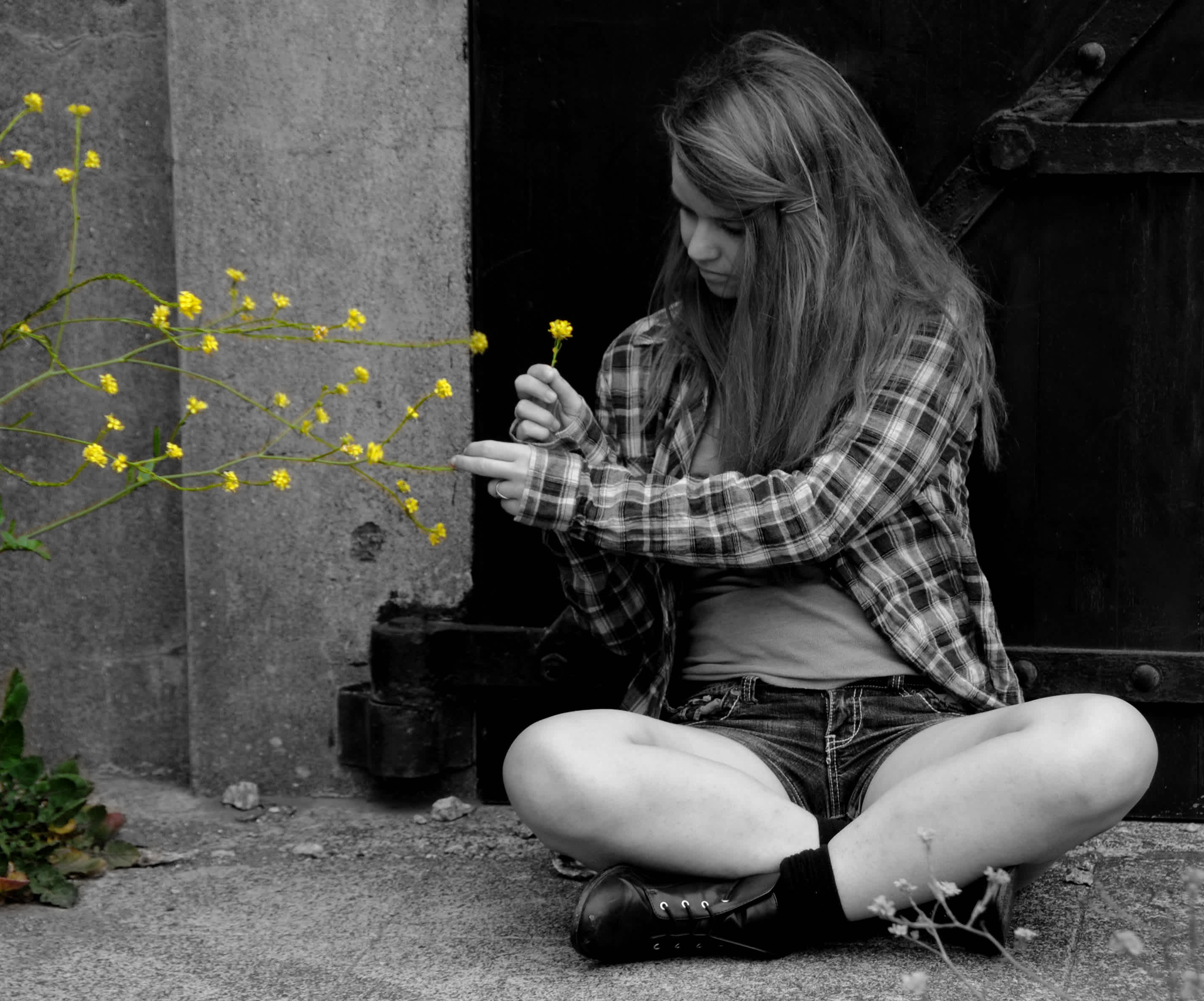 Black and white girl with yellow flowers. 
