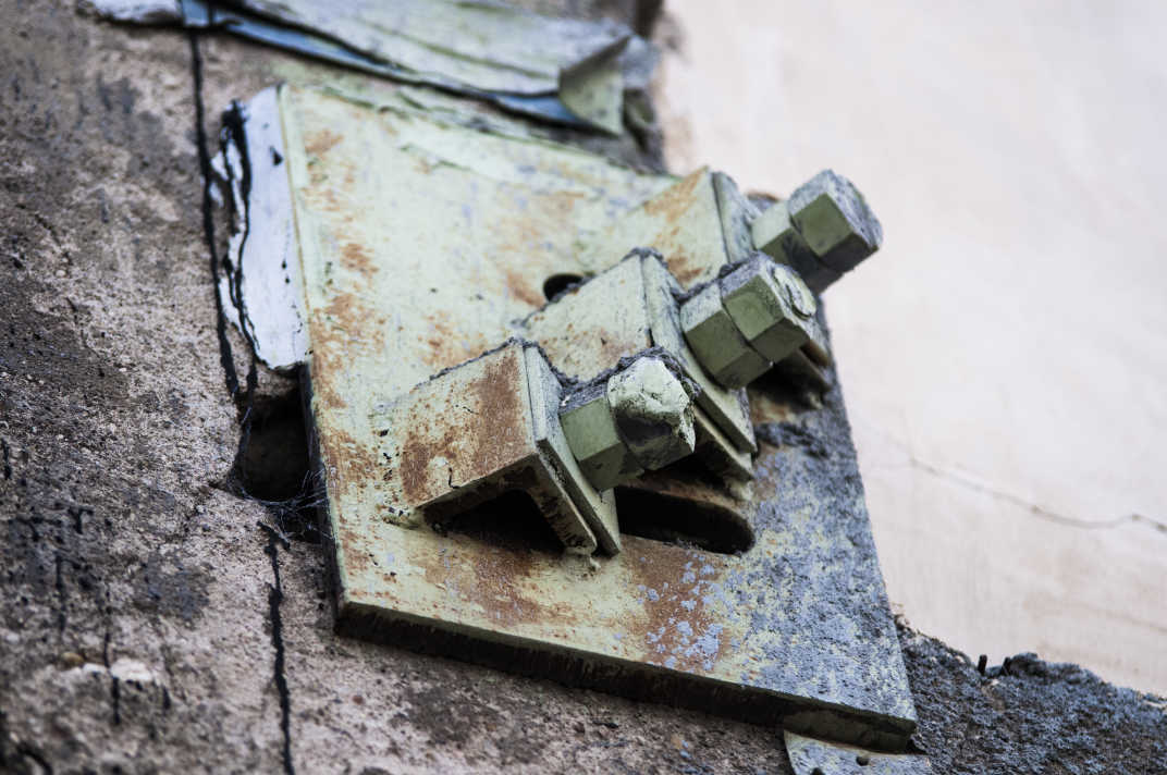 Three screws in a wall in Banning, California.