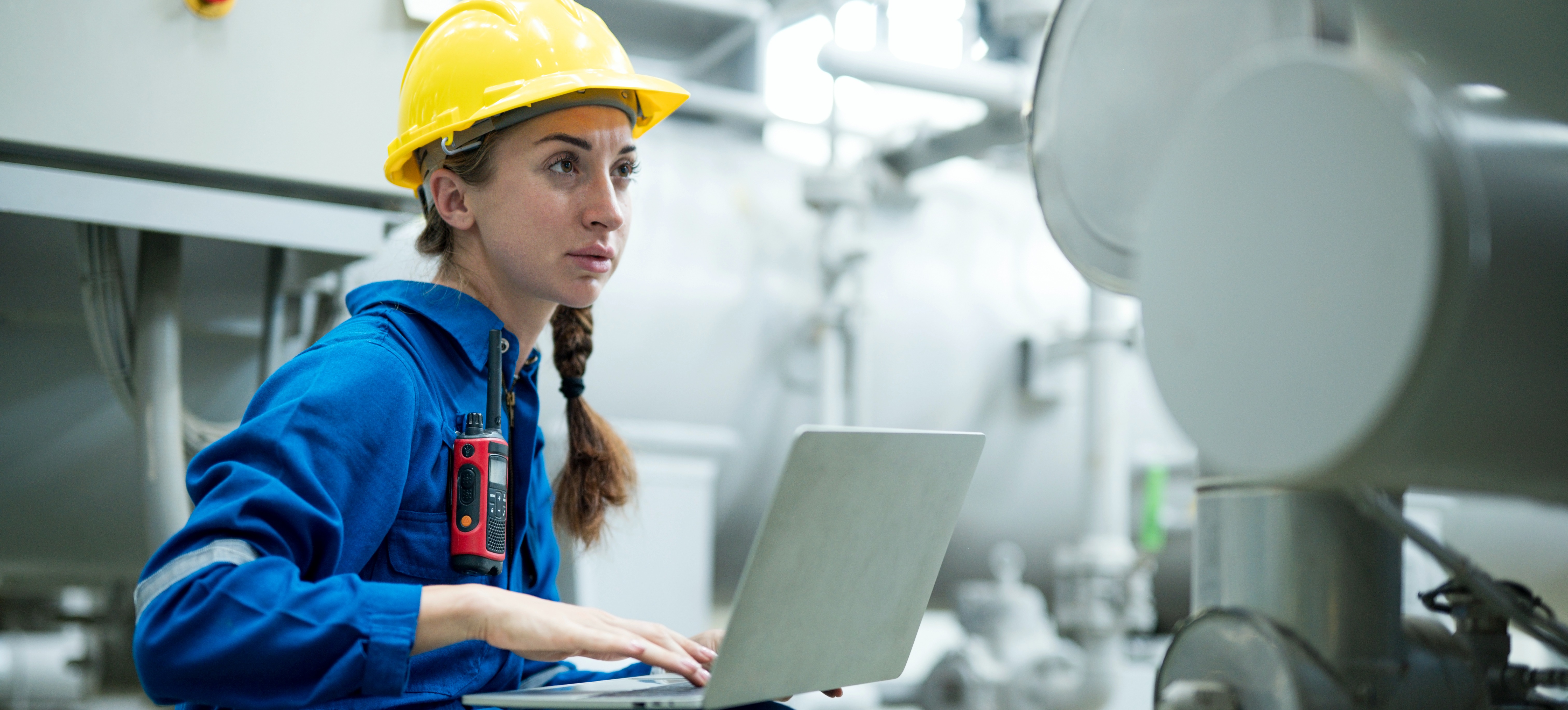 [Featured Image] A manufacturing analyst uses data to help streamline processes at their workplace.