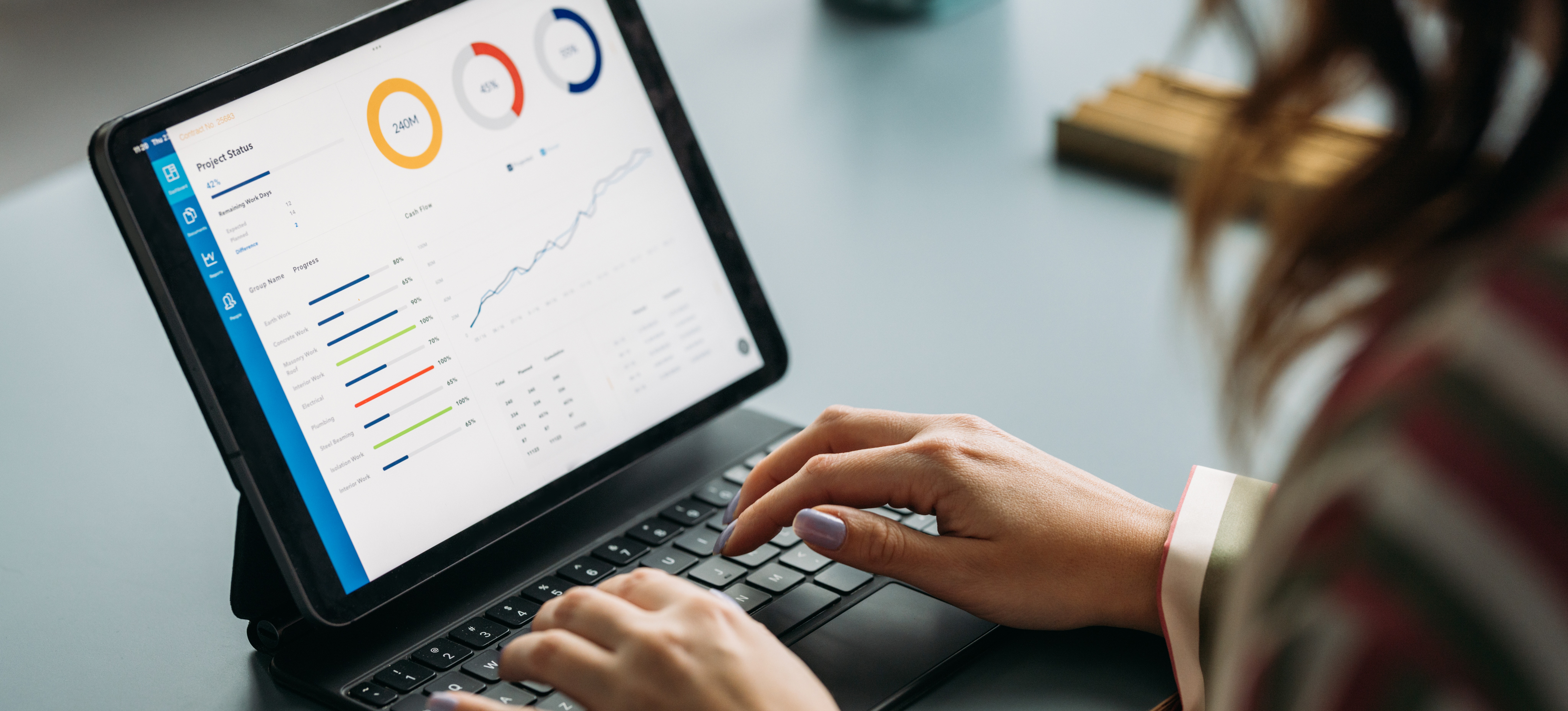 [Featured Image] A professional creating an infographic on a laptop to share with her team in their next meeting.