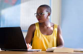 [Featured image] A cybersecurity analyst is on their laptop learning about the different intrusion detection systems.