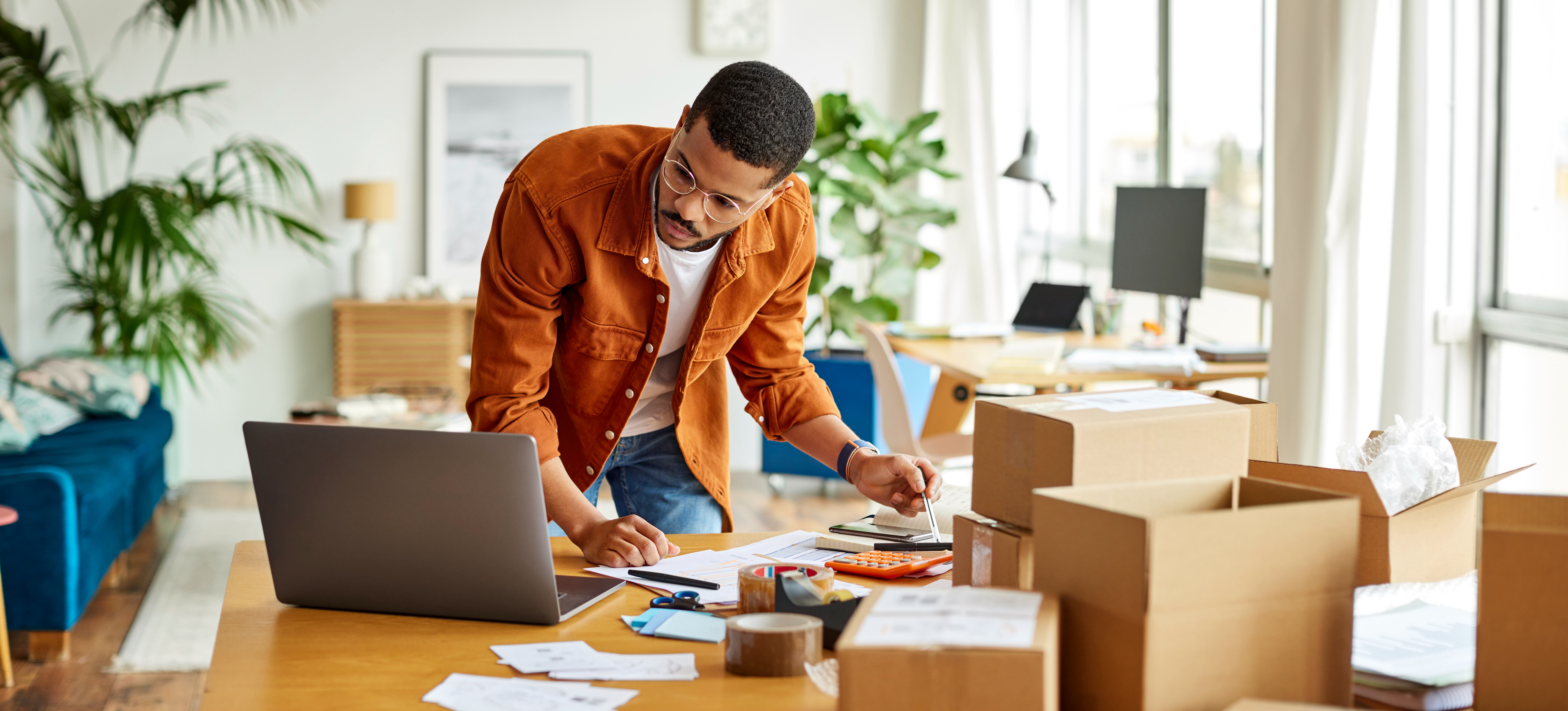 [Featured Image] A male shopify user is changing his shopify store name.