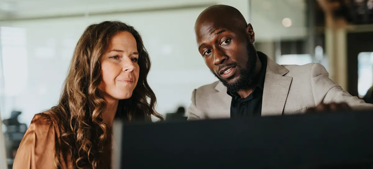 [Featured Image] Two data center operations professionals discuss the schedule of preventive maintenance needed to maintain optimal performance. 
