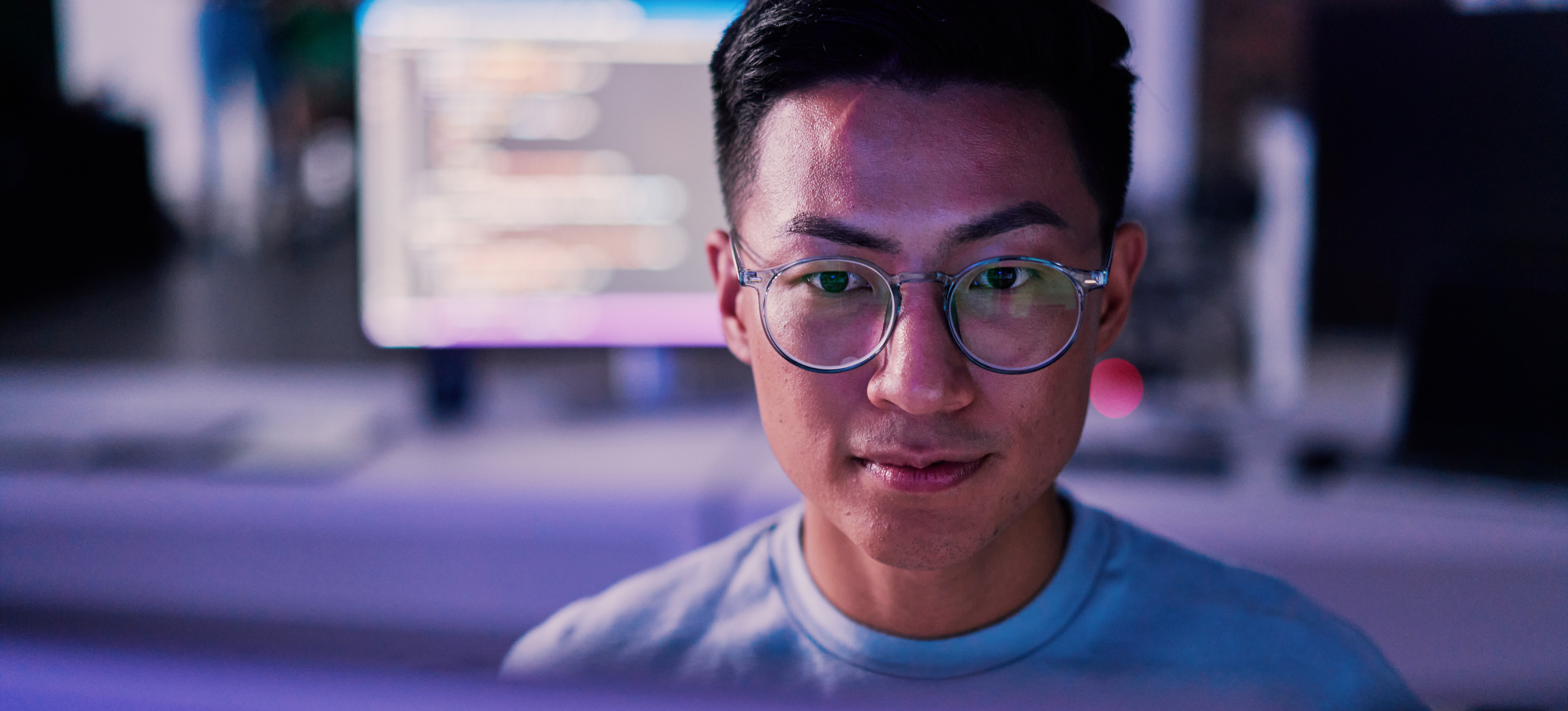 [Featured Image] A businessperson uses Google Dashboards to work with analytics.
