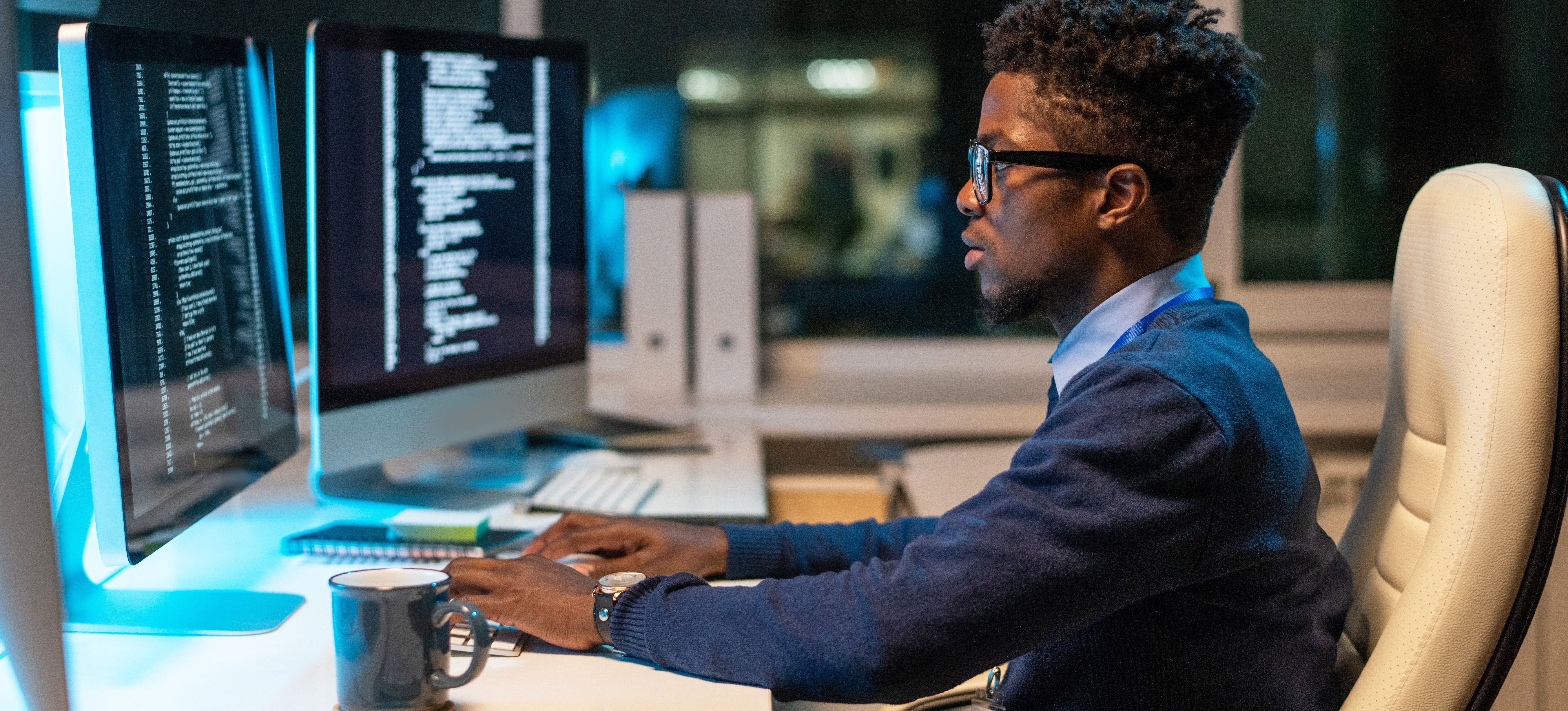 [Featured image] An IT professional sits at a computer workstation and uses a scripting language to automate a task.