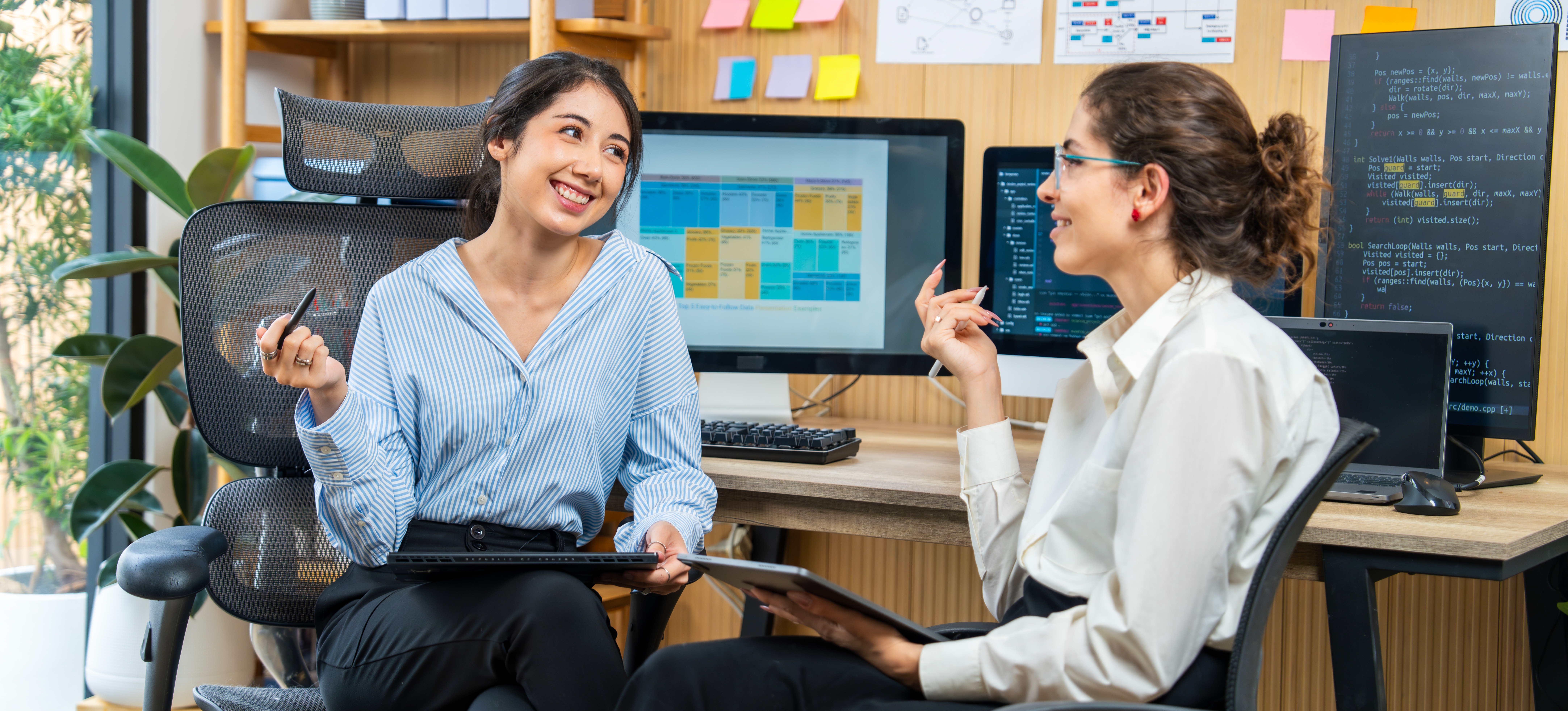 [Featured Image] Professionals working with AI discussing the differences between generative AI and agentic AI in a modern office environment.
