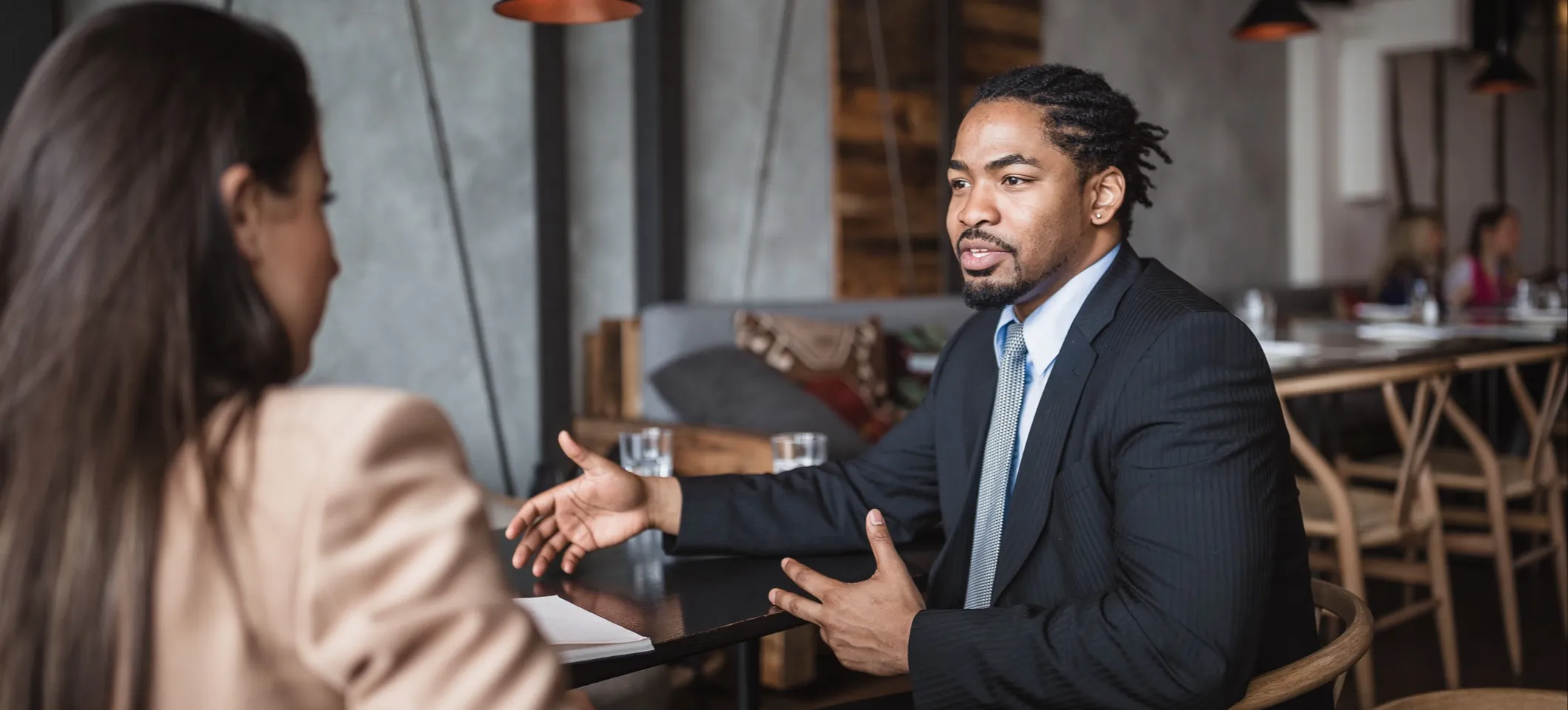 [Featured image] A job candidate negotiates their digital marketing salary.