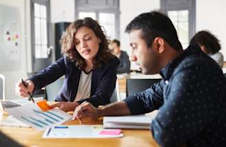 [Featured image] A team of business data analysts meet and discuss visualizations as they prepare to share their findings with key stakeholders.