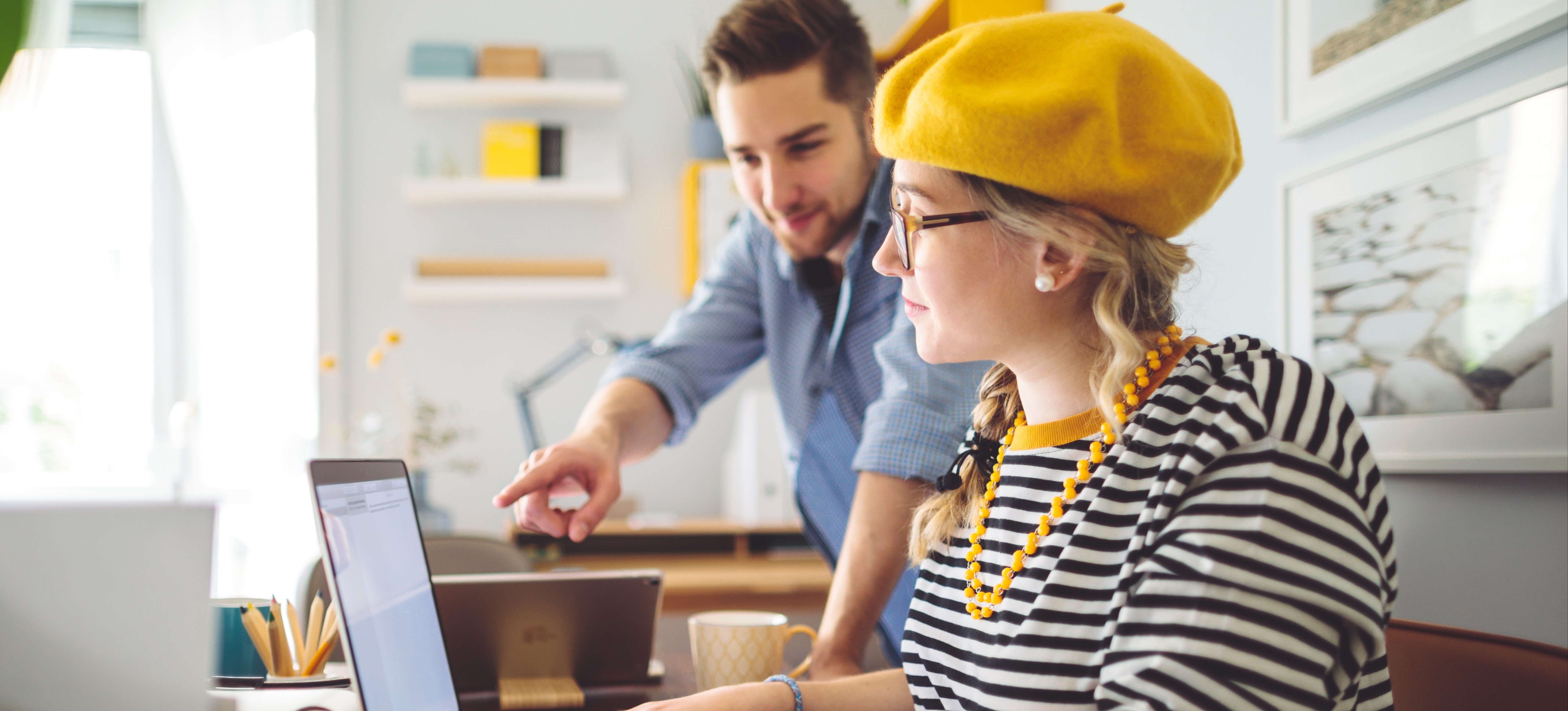 [Featured image] Colleagues working together to decide whether precision vs recall machine learning is more appropriate to evaluate performance.