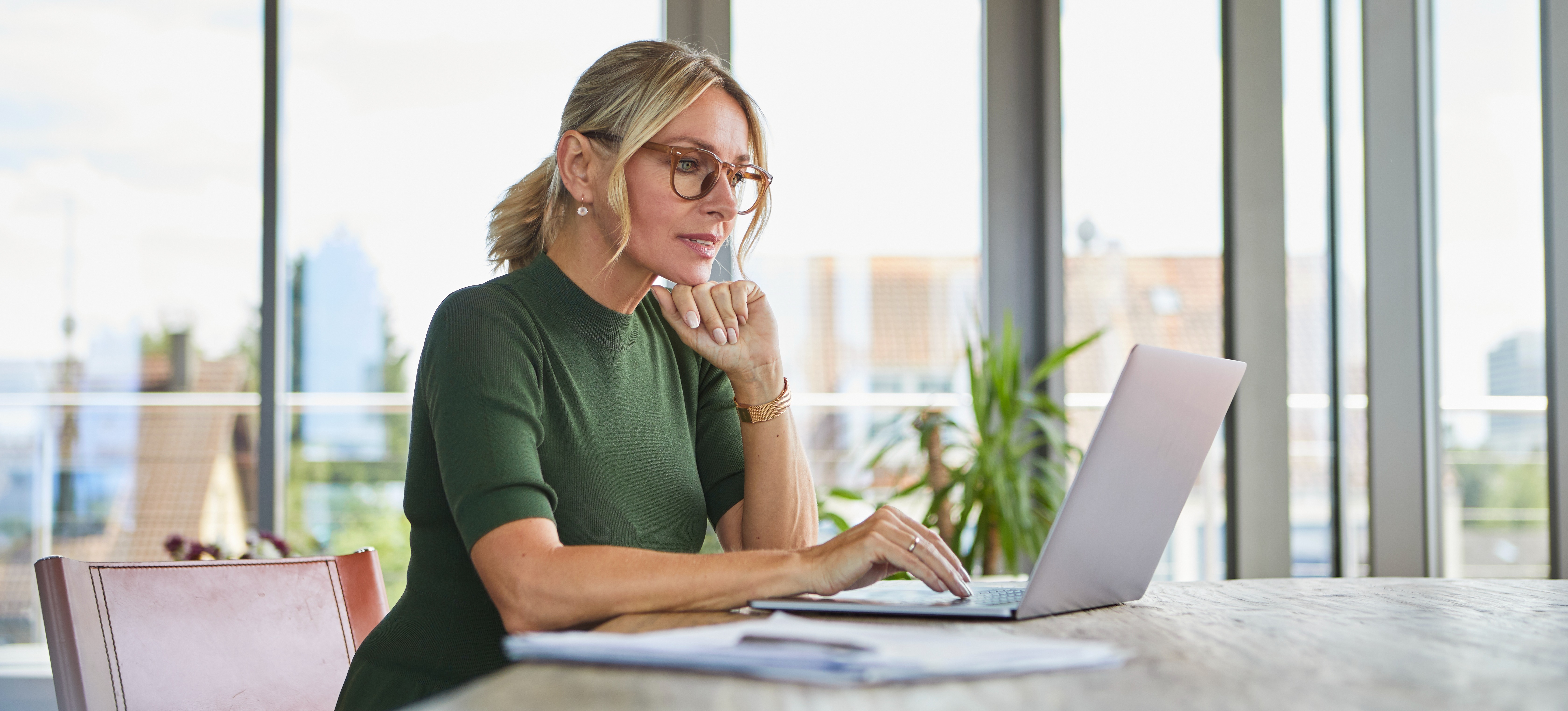 [Featured Image] A person is on a computer reading text generated from a large language model.