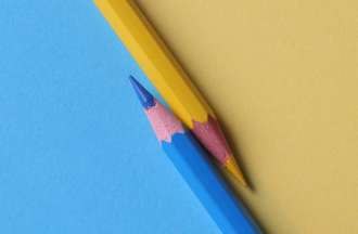 [Featured Image] Two pencils lay in opposite directions. One is yellow, and the other is blue.