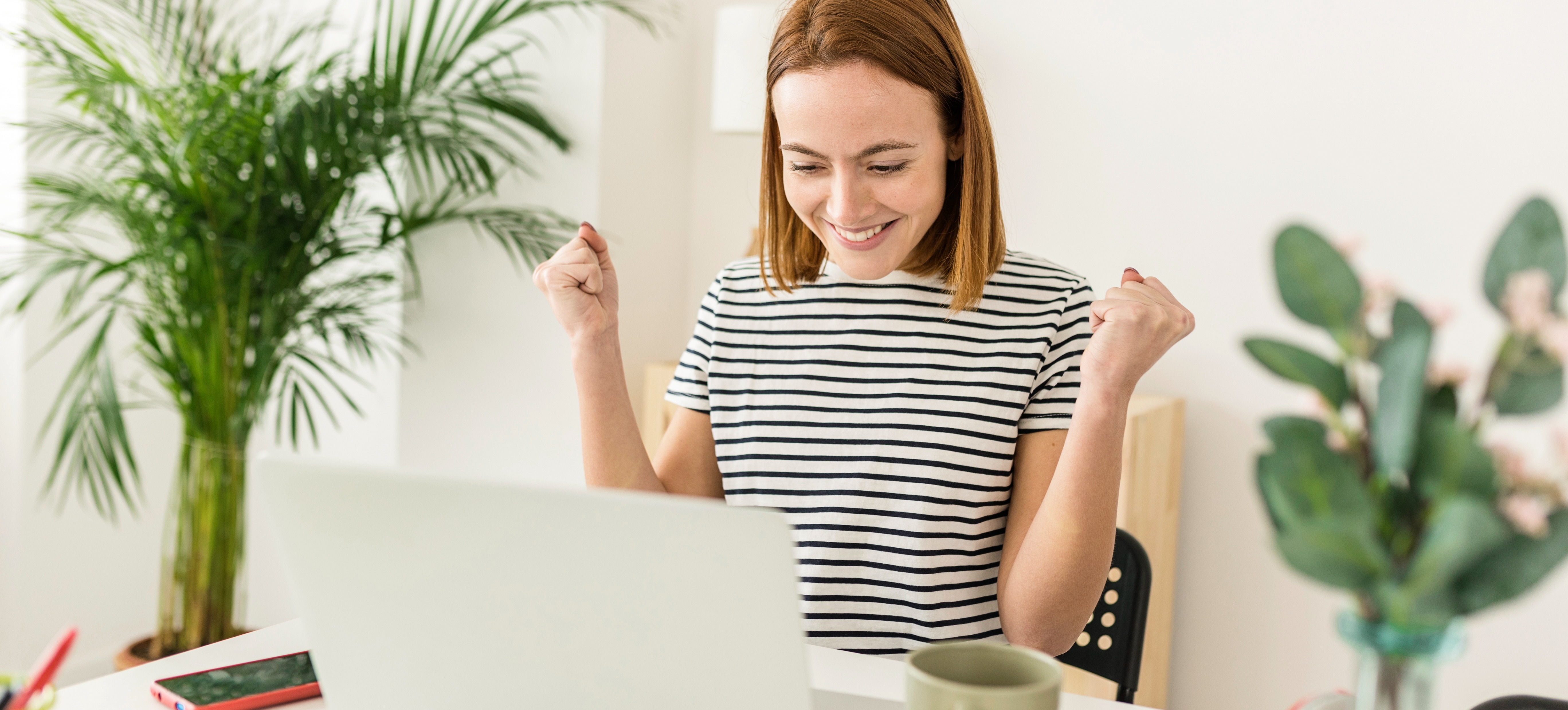 [Featured Image] A happy job hunter celebrates after finding a role that lets them use their SQL skills.
