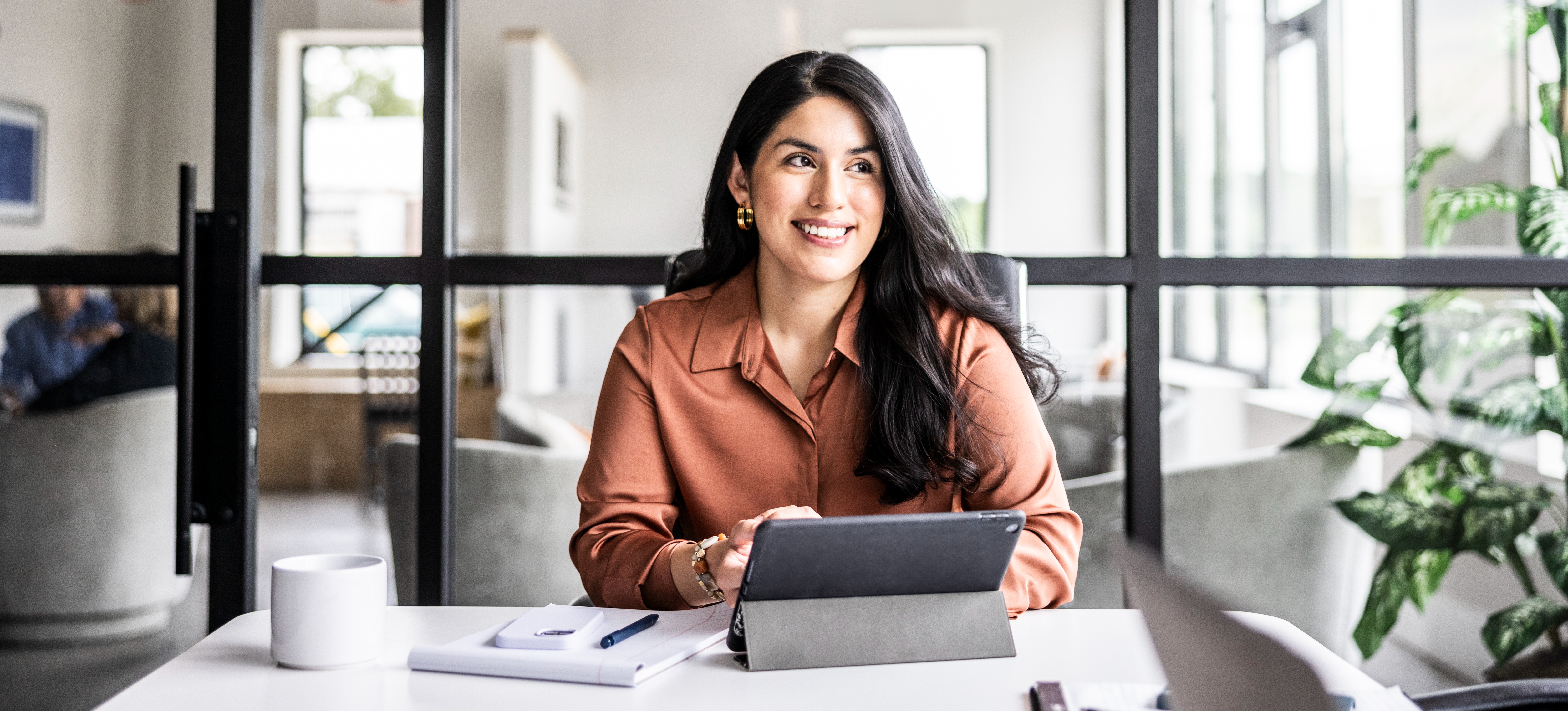 [Featured image] A remote employee works on their laptop to make money online.
