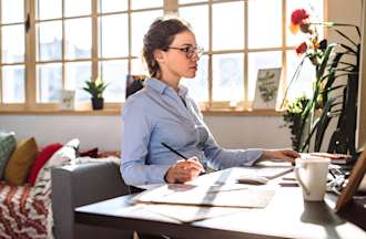 [Featured image] Woman at a workstation working on a professional development course