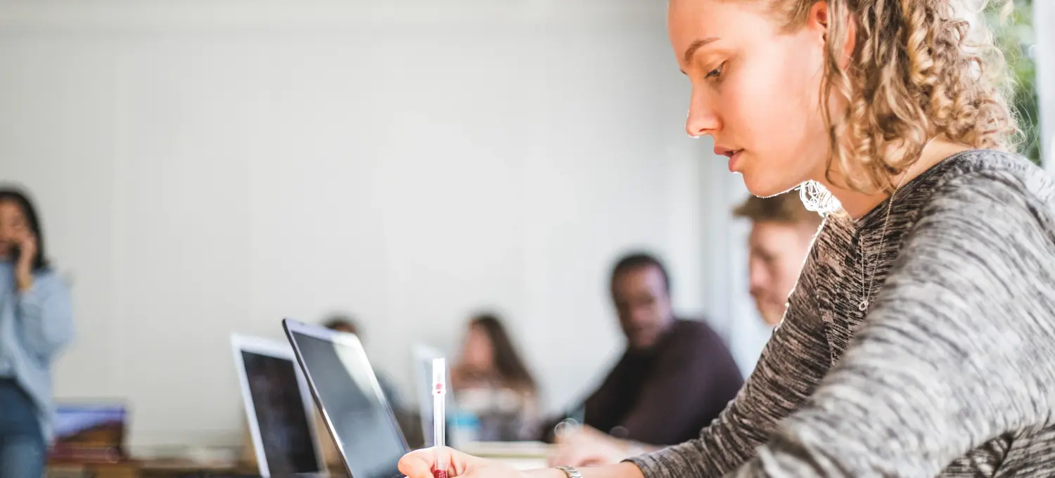 [Featured image] A person in a cybersecurity boot camp learns about deep learning algorithms.  