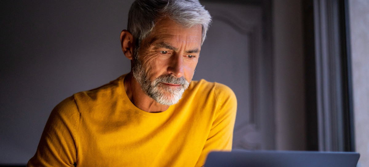 [Featured Image] A person looks at a laptop screen seriously while experiencing ChatGPT limitations with outdated information and biases.
