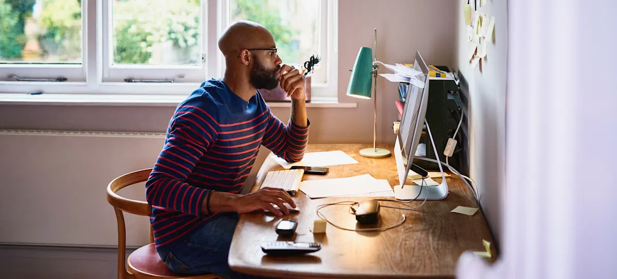 [Featured Image] A Java software developer sits at their desk and studies for a Java certification exam.