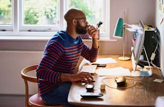 [Featured Image] A Java software developer sits at their desk and studies for a Java certification exam.