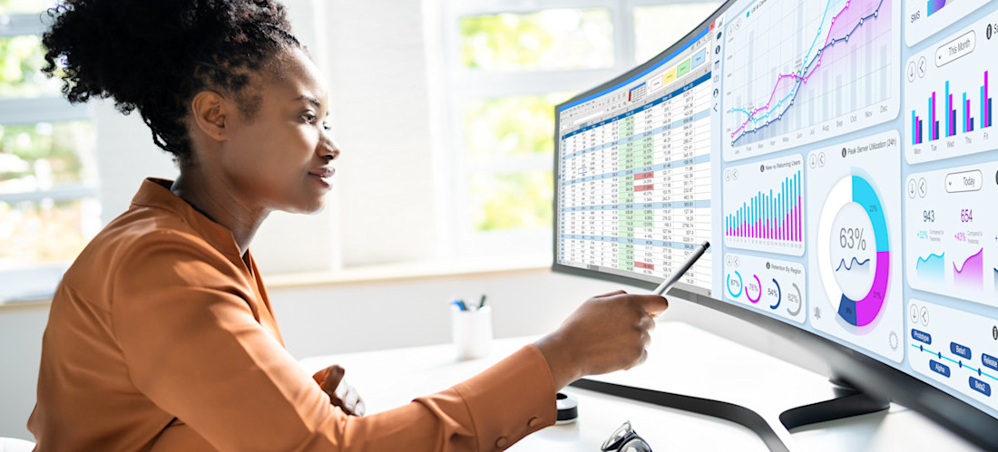 [Featured Image] A data analyst reviews various data insights in preparation for a presentation using storytelling with data to communicate critical metrics to company leadership. 
