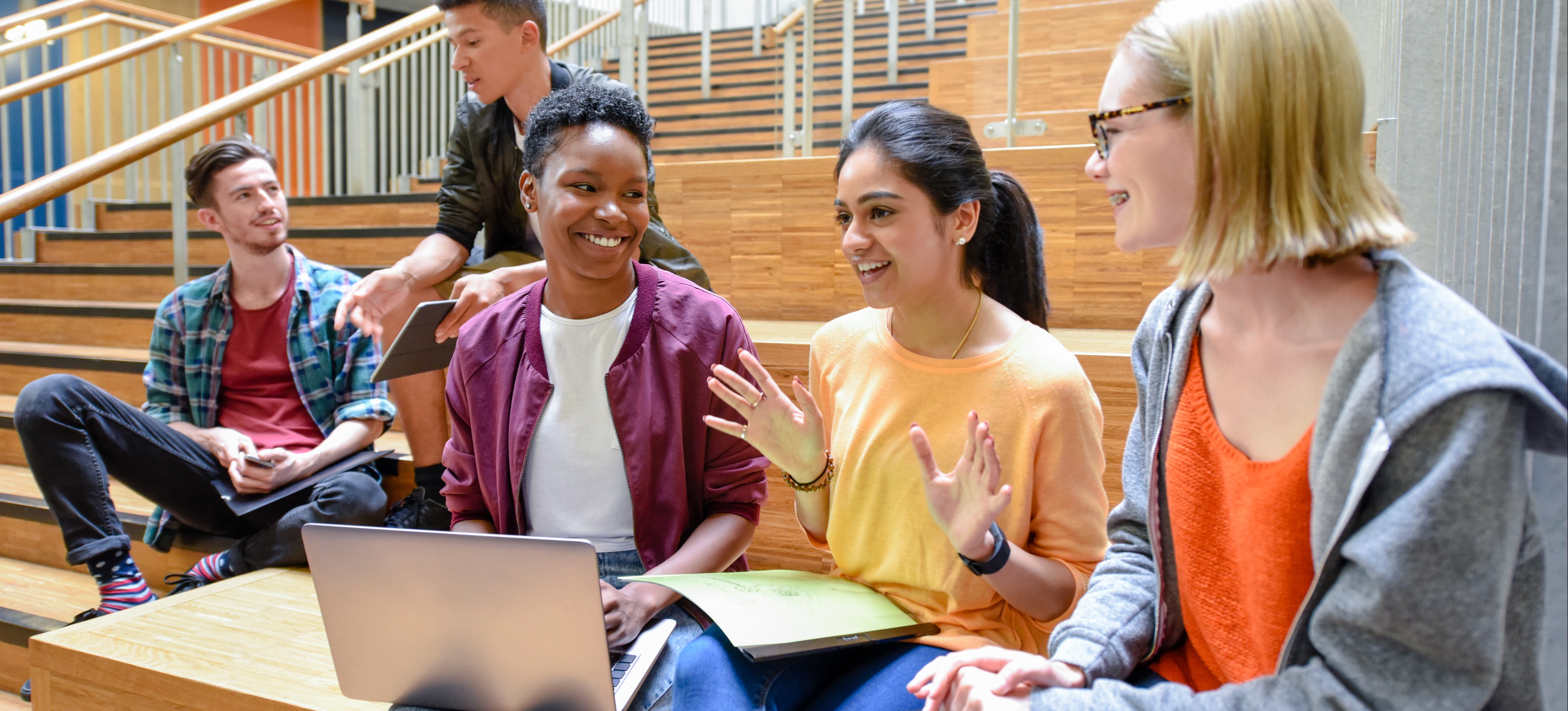 [Featured Image] Associate degree students gather to discuss classwork.