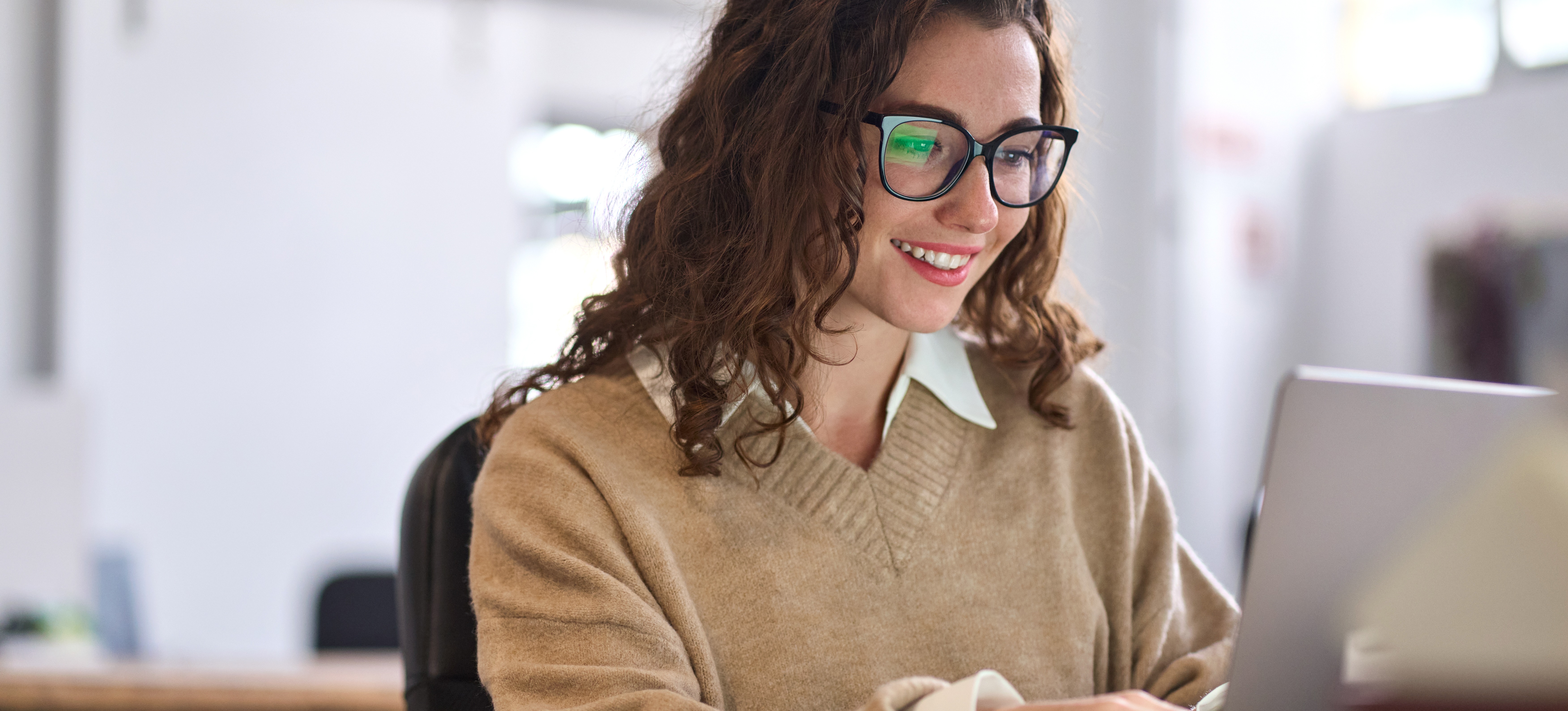[Featured Image] A learner researches marketing coordinator salary information as they plan their career path in marketing. 
