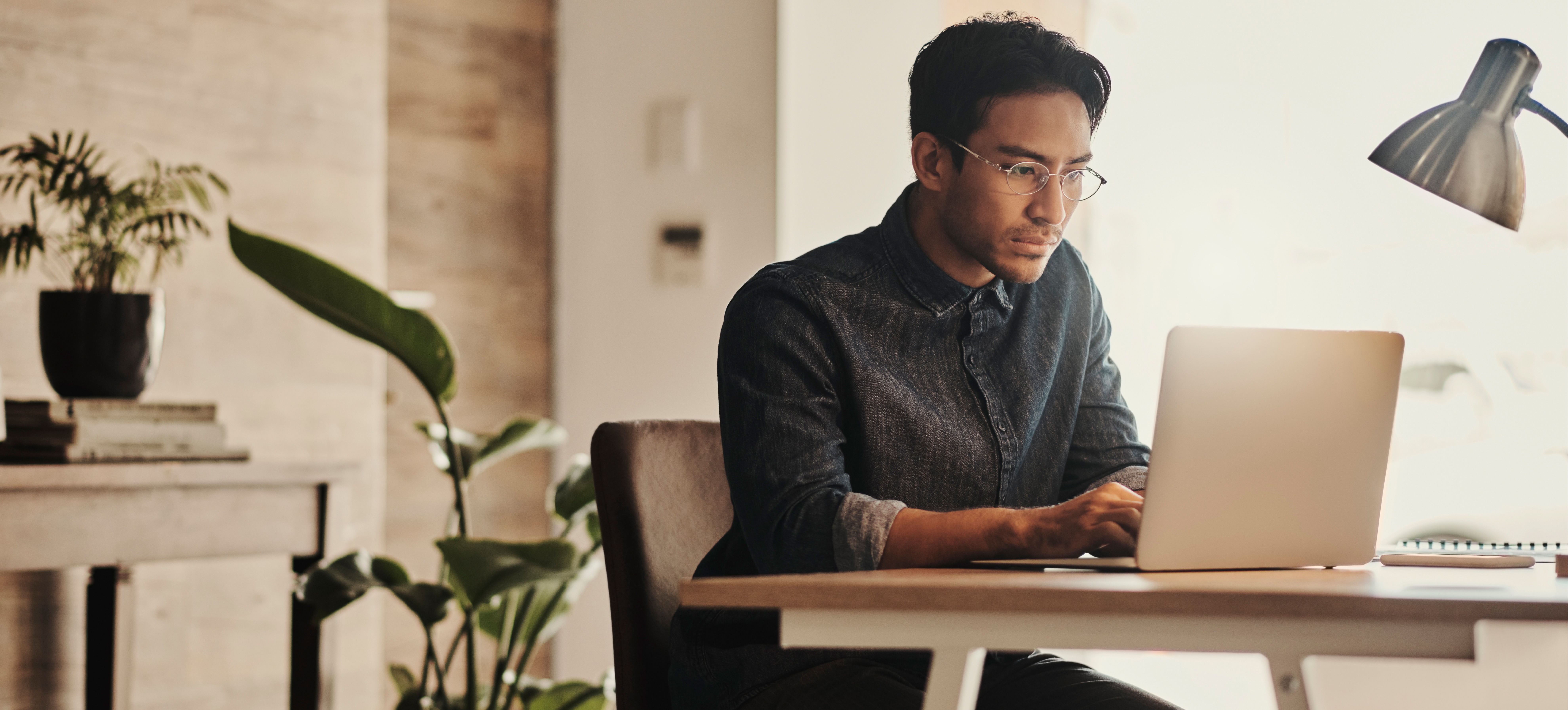 [Feature Image] An aspiring professional searches for information on the average social media specialist salary as they plan their career path. 
