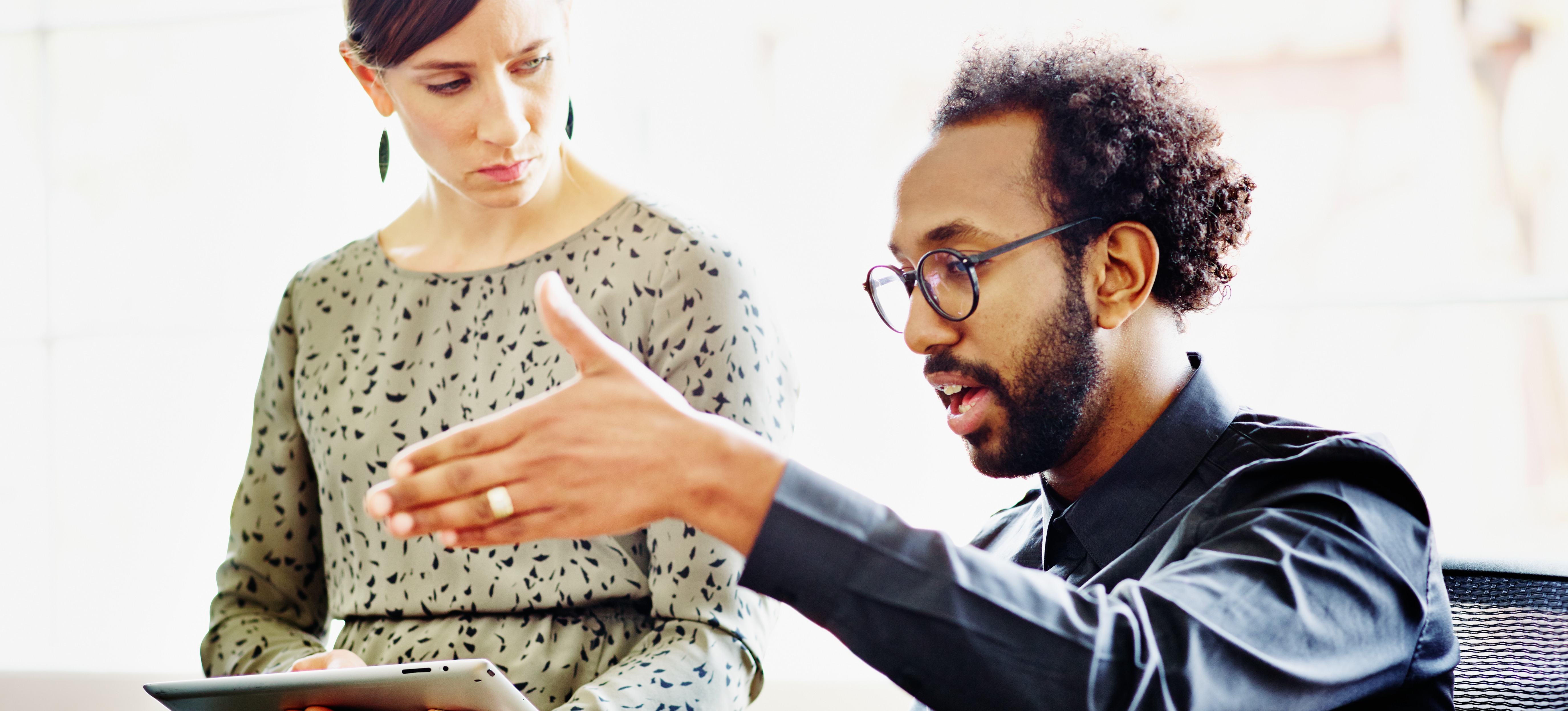 [Featured Image] A network engineer explains Border Gateway Protocol to a new hire who will be working with the company’s internet data management team.