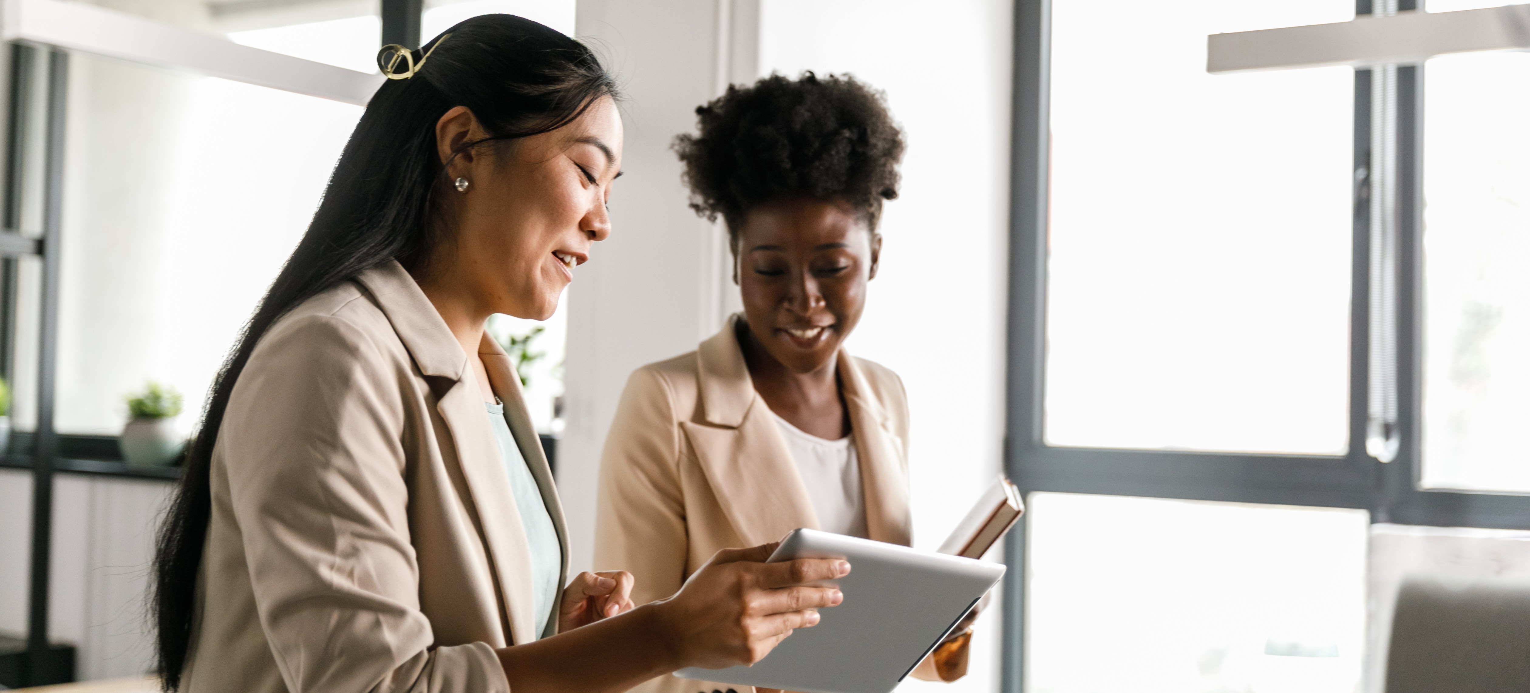 [Featured Image] Two data warehouse architects discuss planned updates for the company’s data warehousing framework. 
