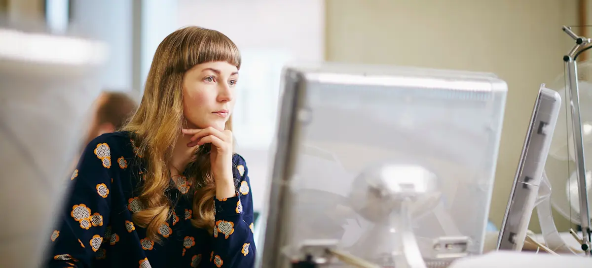 [Featured image] A computer scientist is working on their computer. 