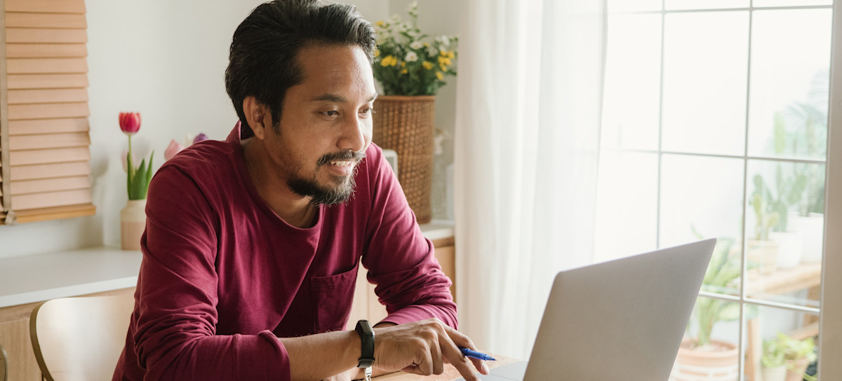 [Featured Image] An aspiring data analyst sits at their laptop in their home office and prepares to earn the PL-300 certification.
