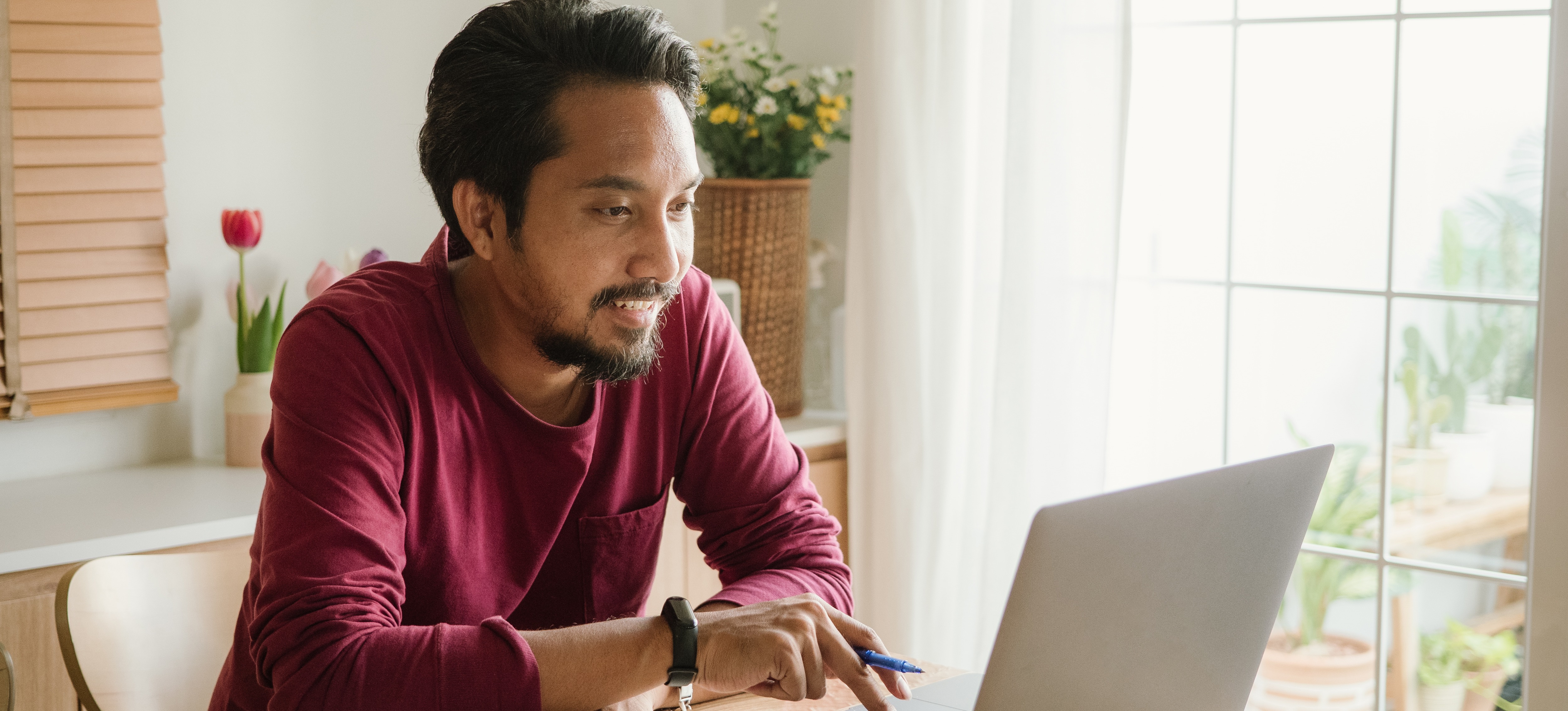[Featured Image] An aspiring data analyst sits at their laptop in their home office and prepares to earn the PL-300 certification.
